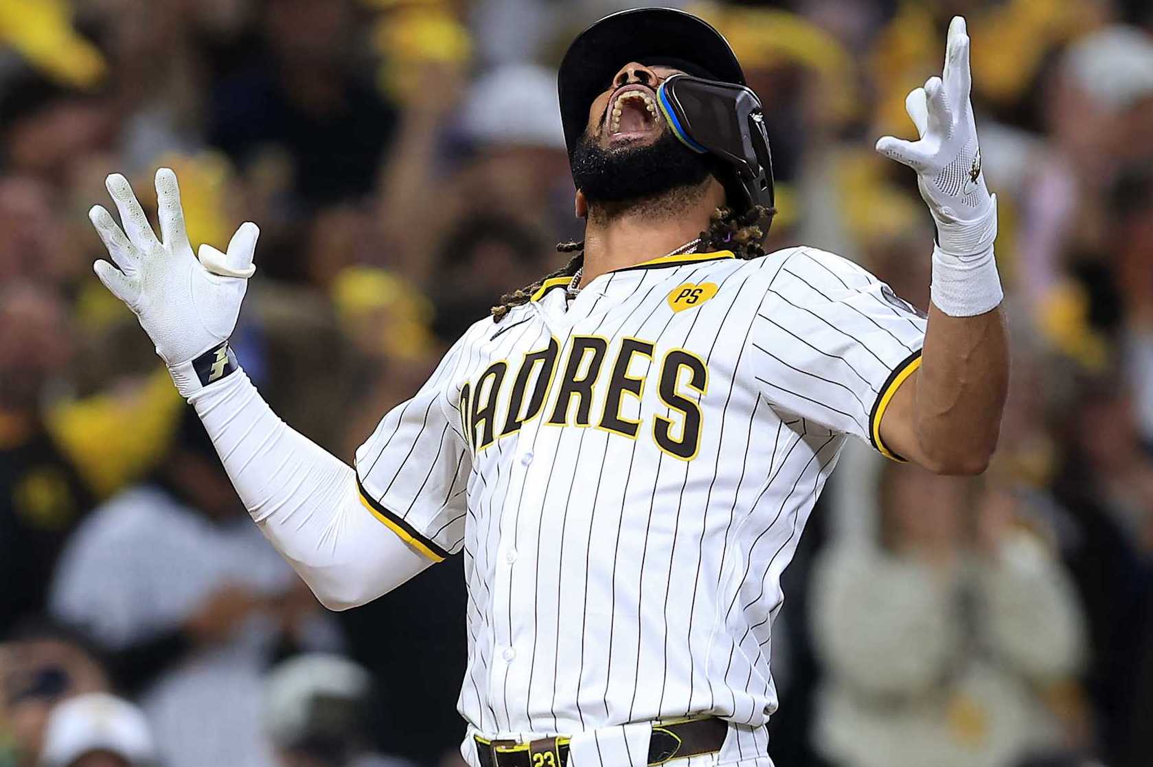 SAN DIEGO, CALIFORNIA - OCTOBER 08: Fernando Tatis Jr. #23 of the San Diego Padres celebrates after hitting a home run in the second inning against the Los Angeles Dodgers during Game Three of the Division Series at Petco Park on October 08, 2024 in San Diego, California. (Photo by Sean M. Haffey/Getty Images)