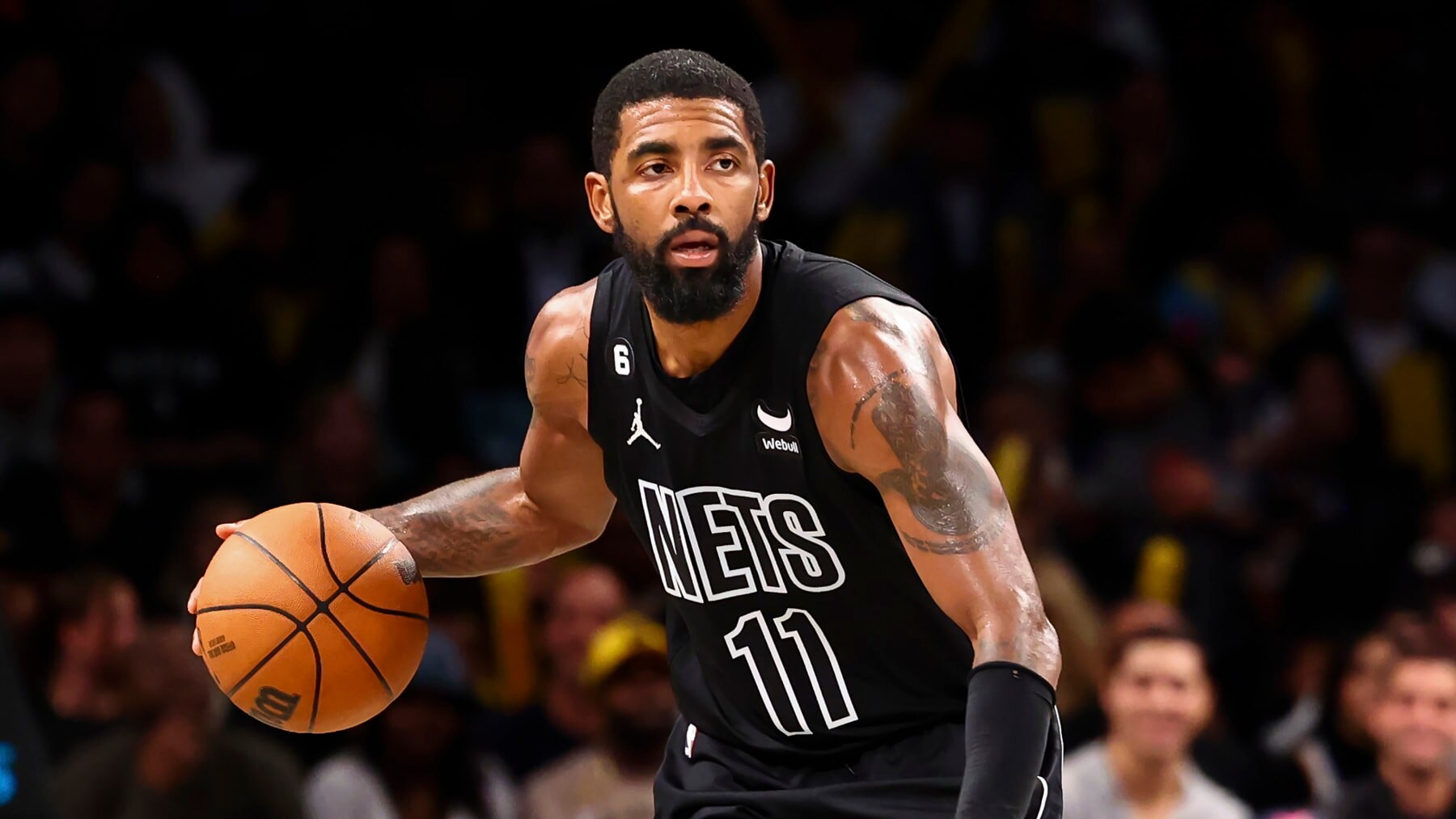 Brooklyn Nets guard Kyrie Irving (11) dribbles against the Indiana Pacers during the second half of an NBA basketball game Monday, Oct. 31, 2022, in New York. (AP Photo/Jessie Alcheh)