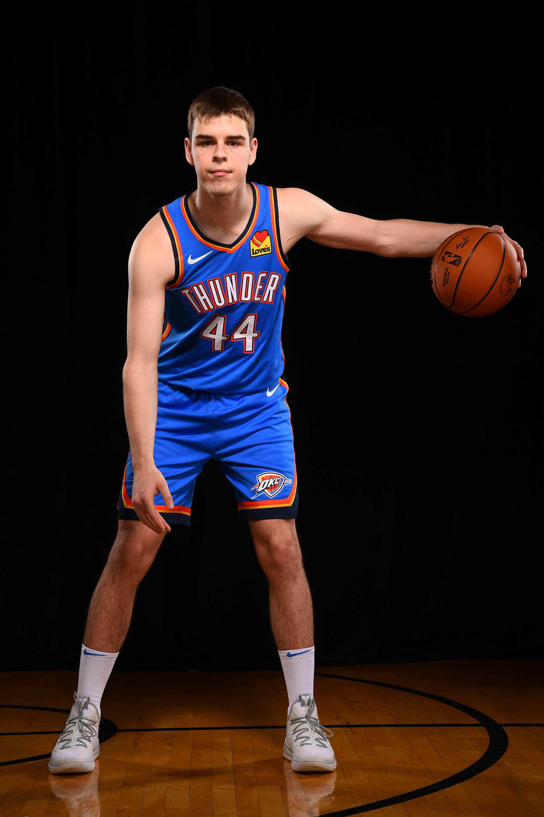 LAS VEGAS, NV - JULY 16: Nikola Topic #44 of the Oklahoma City Thunder poses for a portrait during the 2024 NBA Rookie Photo Shoot on July 16, 2024 at the University of Nevada, Las Vegas campus in Las Vegas, Nevada. NOTE TO USER: User expressly acknowledges and agrees that, by downloading and/or using this Photograph, user is consenting to the terms and conditions of the Getty Images License Agreement. Mandatory Copyright Notice: Copyright 2024 NBAE (Photo by Brian Babineau/NBAE via Getty Images)