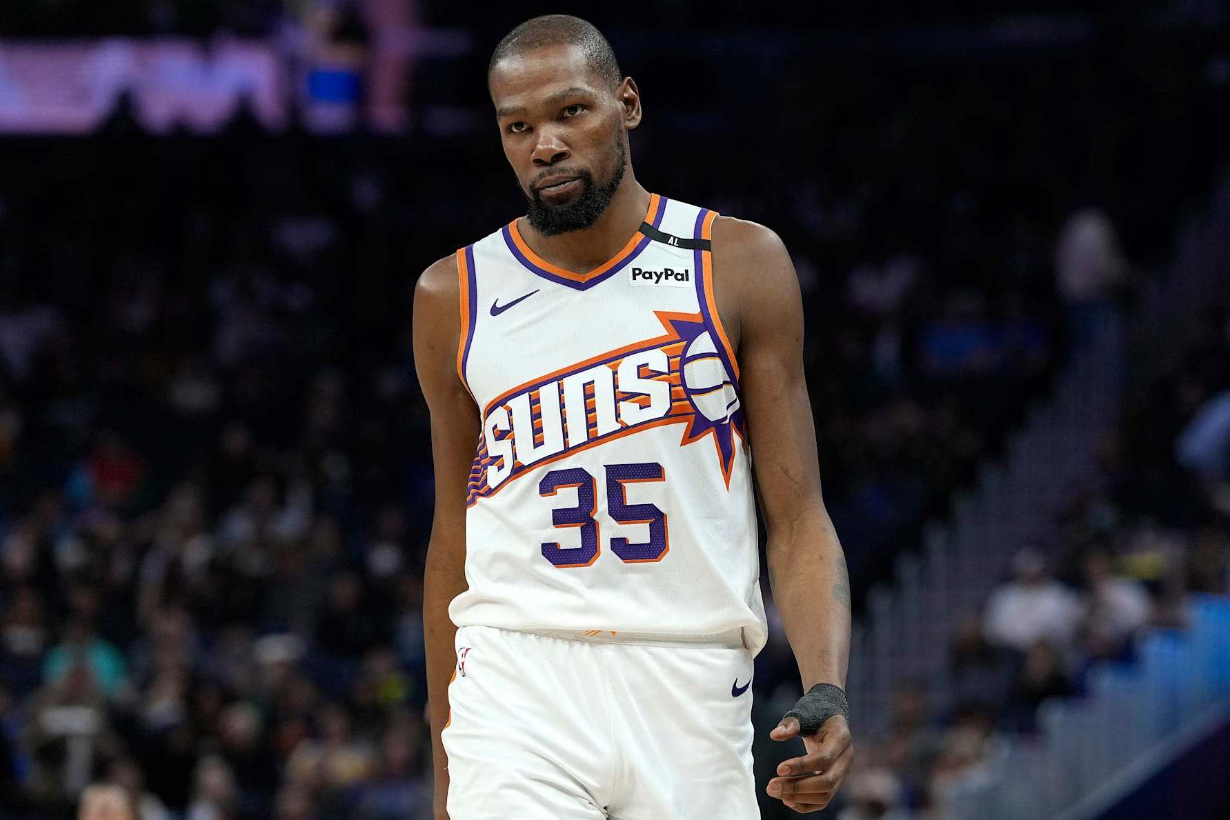 SAN FRANCISCO, CALIFORNIA - JANUARY 31: Kevin Durant #35 of the Phoenix Suns looks on against the Golden State Warriors during the second half of an NBA basketball game at Chase Center on January 31, 2025 in San Francisco, California. NOTE TO USER: User expressly acknowledges and agrees that, by downloading and or using this photograph, User is consenting to the terms and conditions of the Getty Images License Agreement. (Photo by Thearon W. Henderson/Getty Images)