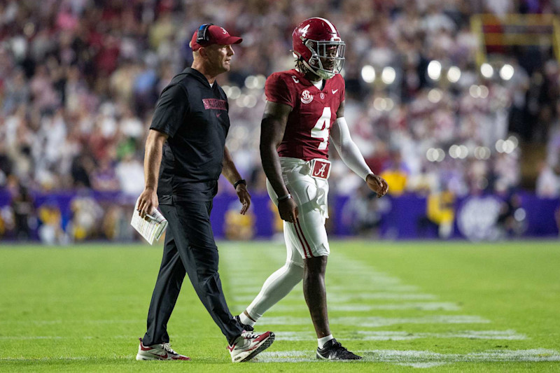BATON ROUGE, LOUISIANA - NOVEMBER 09: Head coach Kalen DeBoer and Jalen Milroe #4 of the Alabama Crimson Tide after scoring their first touchdown against the LSU Tigers at Tiger Stadium on November 9, 2024 in Baton Rouge, Louisiana. (Photo by Aric Becker/ISI Photos/Getty Images)