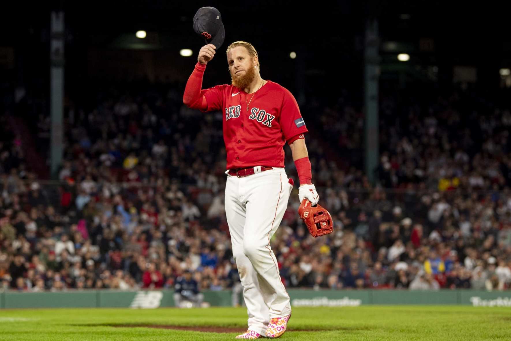 BOSTON, MA - SEPTEMBER 27: Justin Turner #2 of the Boston Red Sox reacts as he is removed from the game in the sixth inning against the Tampa Bay Rays on September 27, 2023 at Fenway Park in Boston, Massachusetts. (Photo by Billie Weiss/Boston Red Sox/Getty Images)
