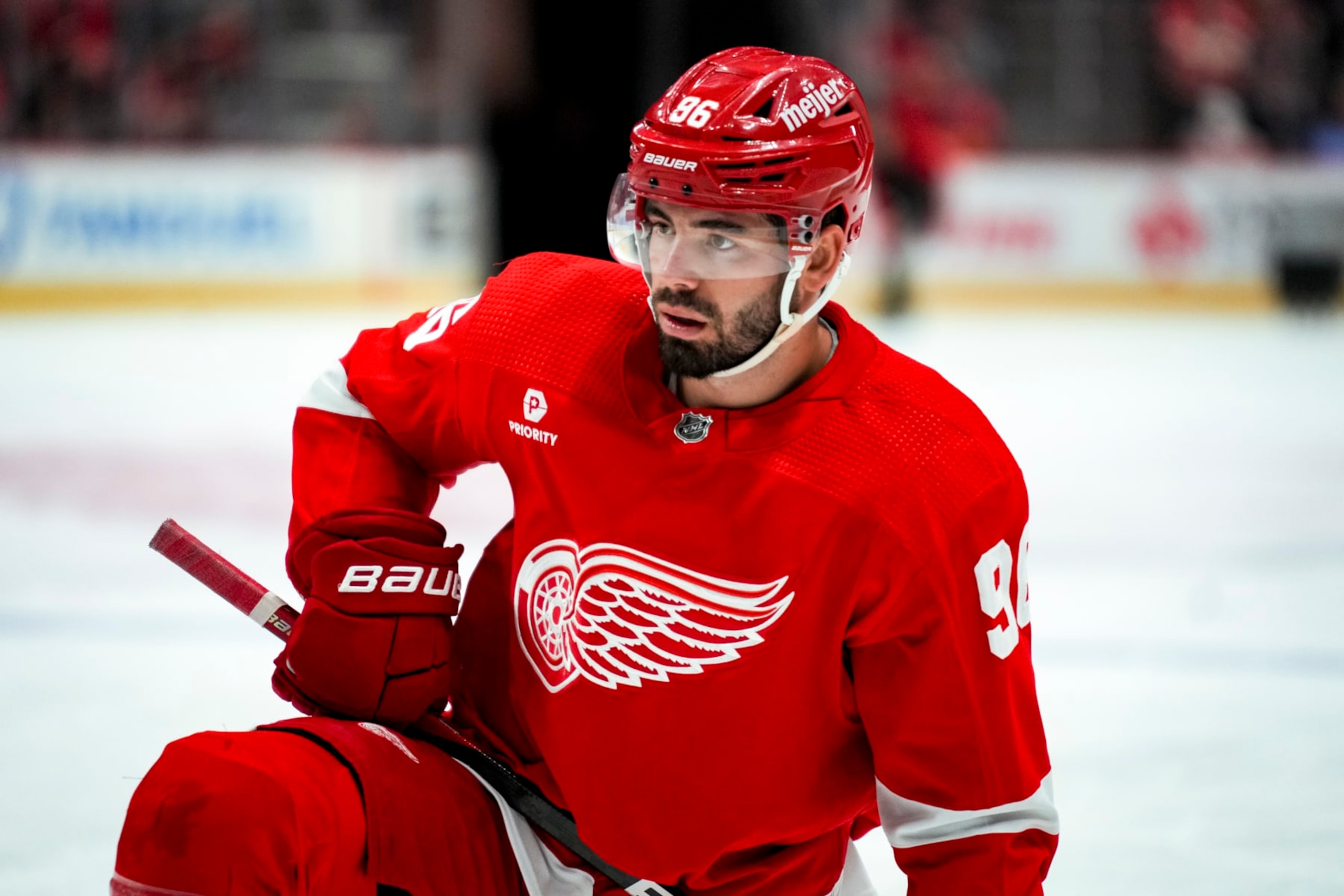 DETROIT, MICHIGAN - APRIL 05: Jake Walman #96 of the Detroit Red Wings looks on against the New York Rangers at Little Caesars Arena on April 05, 2024 in Detroit, Michigan. (Photo by Nic Antaya/Getty Images) DETROIT, MICHIGAN - APRIL 05: Jake Walman #96 of the Detroit Red Wings looks on against the New York Rangers at Little Caesars Arena on April 05, 2024 in Detroit, Michigan. (Photo by Nic Antaya/Getty Images)