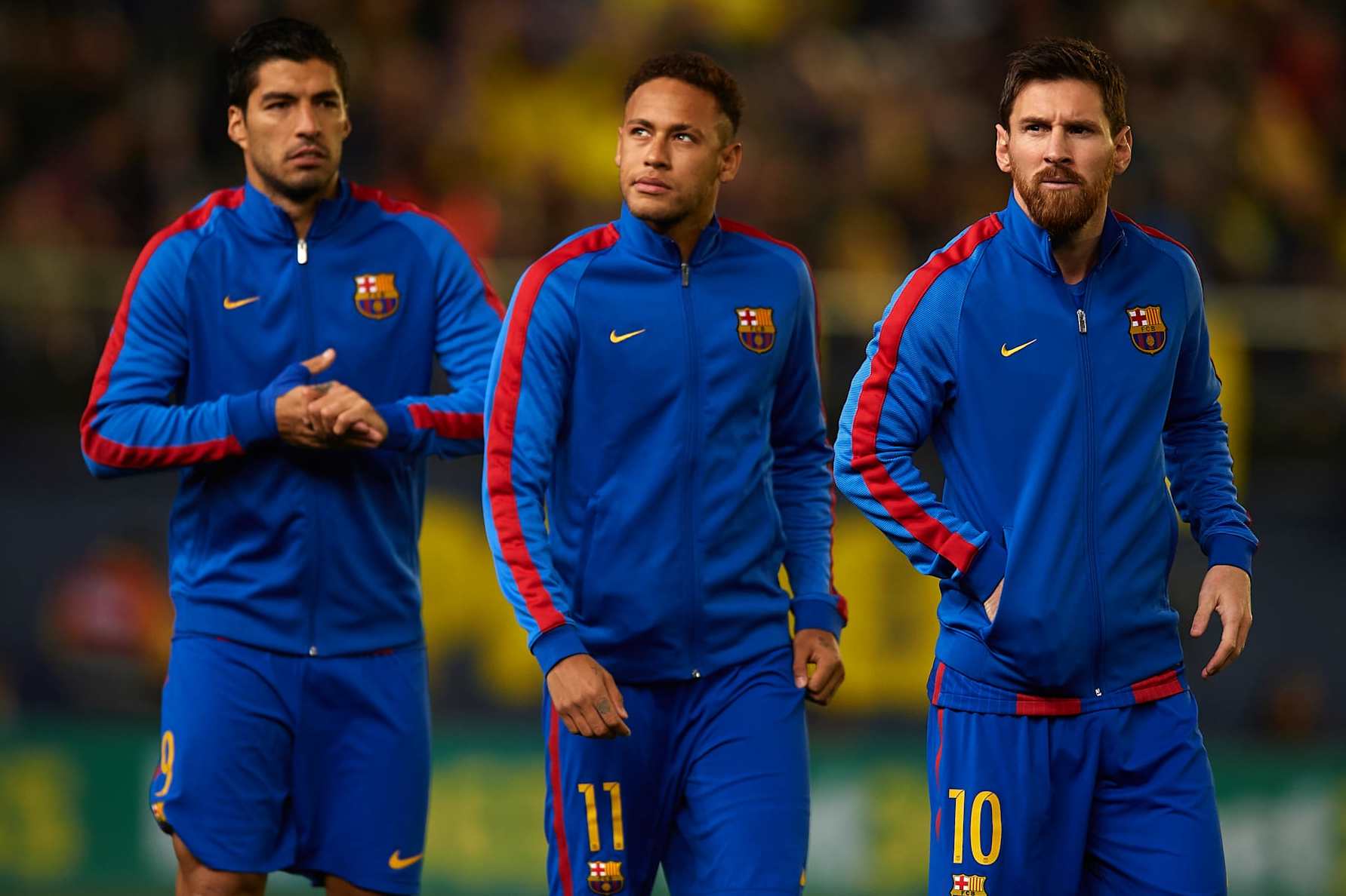 VILLARREAL, SPAIN - JANUARY 08: Lionel Messi (R), Neymar JR and Luis Suarez (L) of Barcelona look on prior to the La Liga match between Villarreal CF and FC Barcelona at Estadio de la Ceramica on January 8, 2017 in Villarreal, Spain. (Photo by Manuel Queimadelos Alonso/Getty Images)