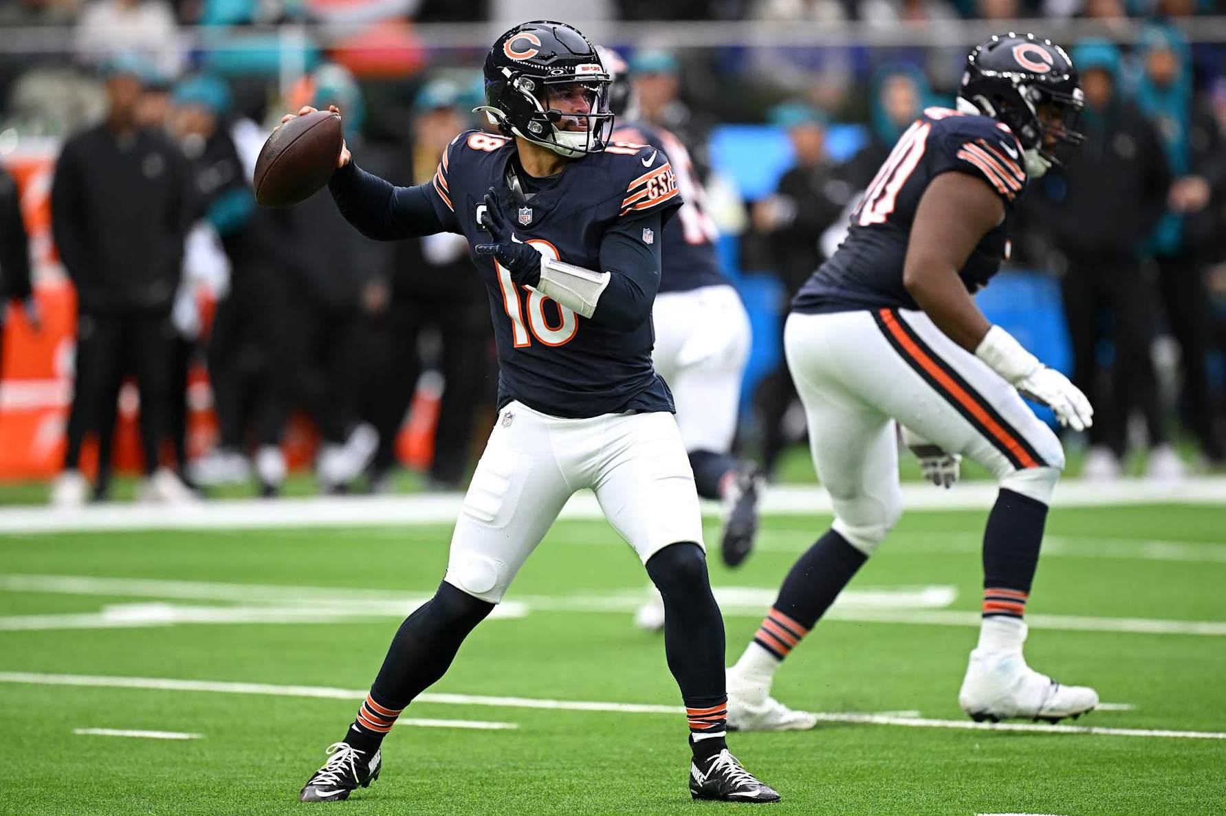 LONDON, ENGLAND - OCTOBER 13: Caleb Williams of Chicago Bears passes the ball during the NFL match between Jacksonville Jaguars and Chicago Bears at Tottenham Hotspur Stadium on October 13, 2024 in London, England. (Photo by Harry Murphy/Getty Images)