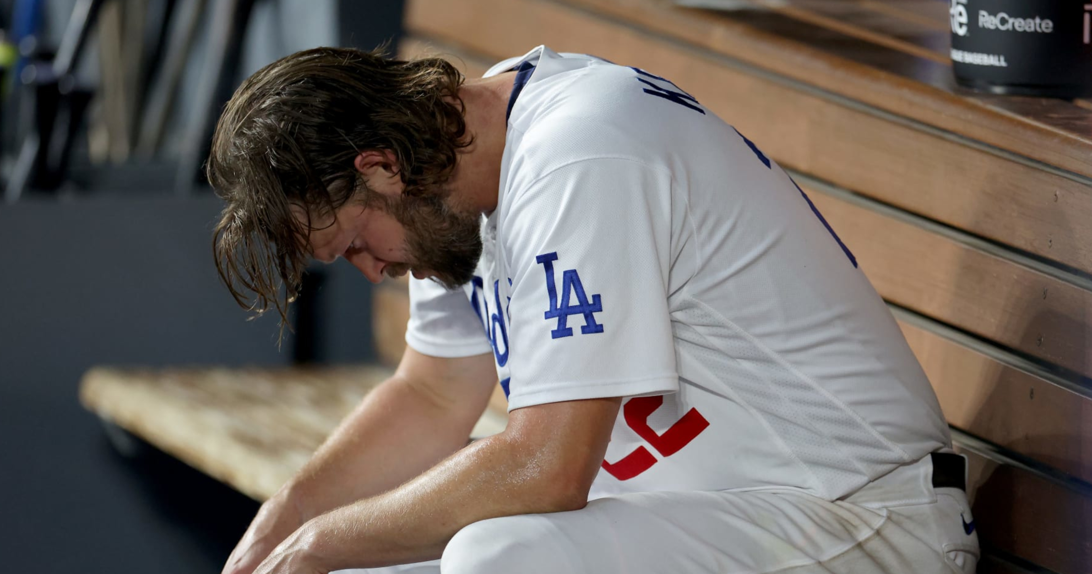 Dodgers' Clayton Kershaw exits with back pain before sweep