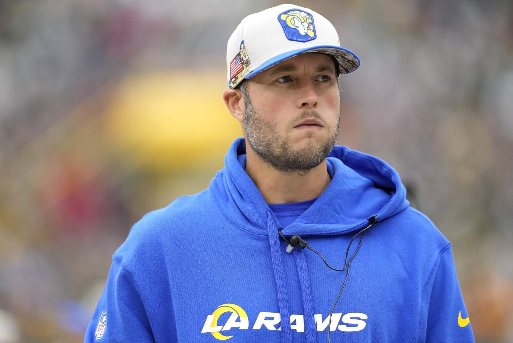 GREEN BAY, WISCONSIN - NOVEMBER 05: Matthew Stafford #9 of the Los Angeles Rams looks on from the sideline in the first quarter of a game against the Green Bay Packers at Lambeau Field on November 05, 2023 in Green Bay, Wisconsin. (Photo by Patrick McDermott/Getty Images)