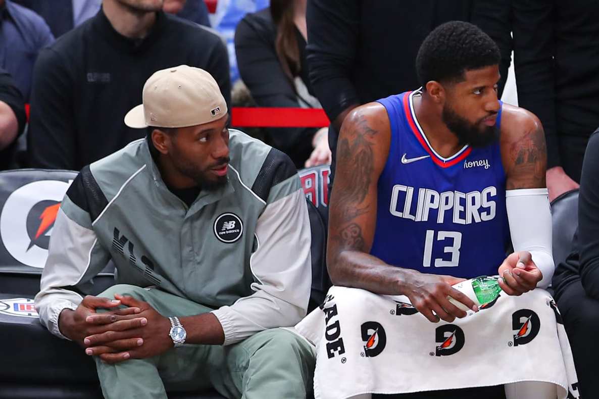 CHICAGO, IL - MARCH 31: Los Angeles Clippers forward Kawhi Leonard (2) and Los Angeles Clippers guard Paul George (13) sit on the bench during a NBA game between the Los Angeles Clippers and the Chicago Bulls on March 31, 2022 at the United Center in Chicago, IL. (Photo by Melissa Tamez/Icon Sportswire via Getty Images) CHICAGO, IL - MARCH 31: Los Angeles Clippers forward Kawhi Leonard (2) and Los Angeles Clippers guard Paul George (13) sit on the bench during a NBA game between the Los Angeles Clippers and the Chicago Bulls on March 31, 2022 at the United Center in Chicago, IL. (Photo by Melissa Tamez/Icon Sportswire via Getty Images)