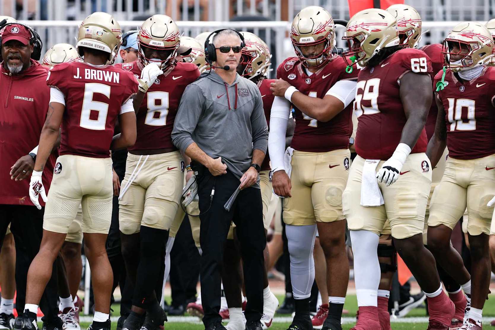 TALLAHASSEE, FL - SEPTEMBER 14: Head Coach Mike Norvell talk with Quarterback DJ Uiagalelei #4 of the Florida State Seminoles before taking the field during the game against the Memphis Tigers at Doak Campbell Stadium on Bobby Bowden Field on September 14, 2024 in Tallahassee, Florida. The Tigers defeated the Seminoles 20 to 12. (Photo by Don Juan Moore/Getty Images)