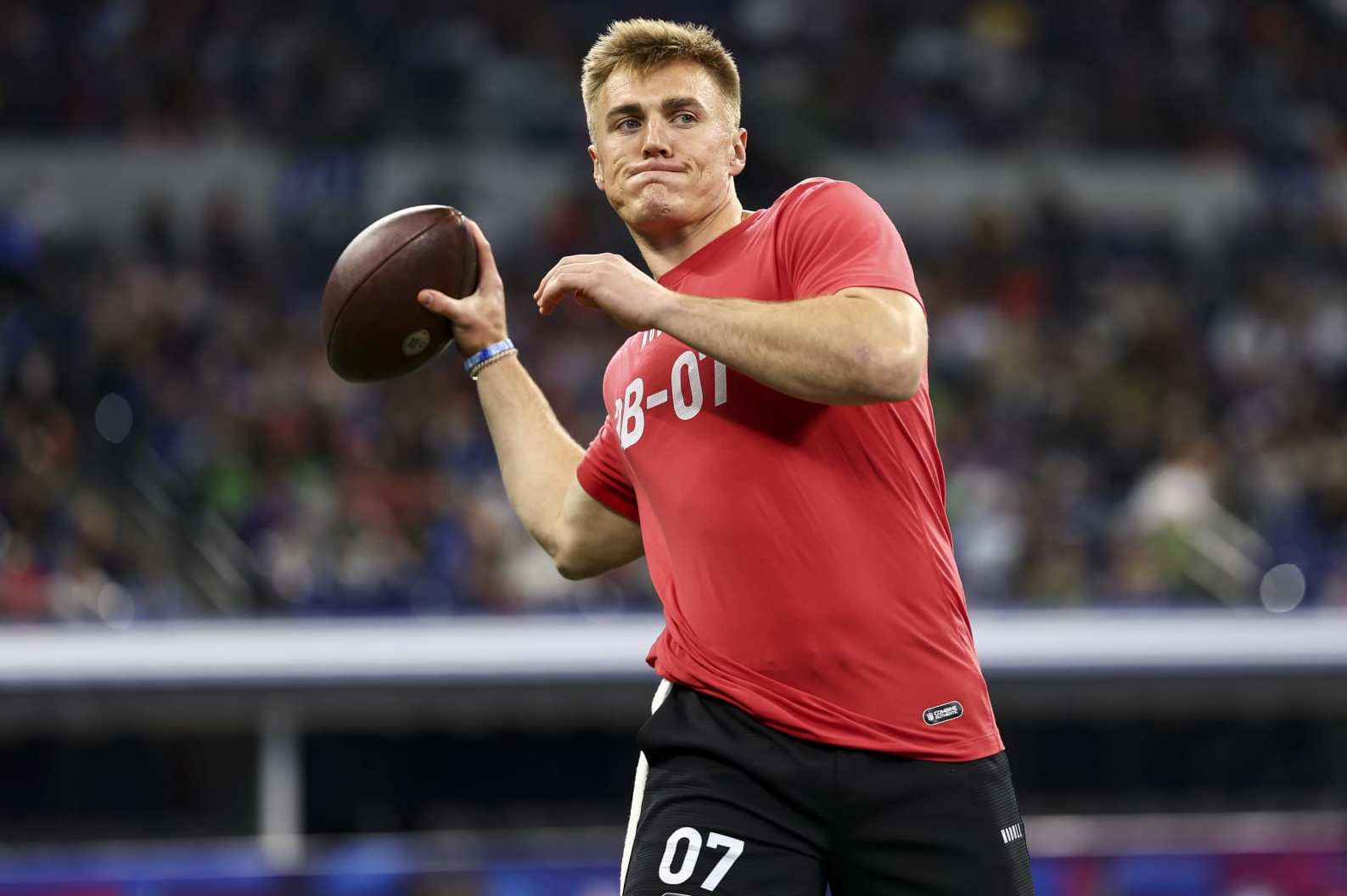 INDIANAPOLIS, INDIANA - MARCH 2: Bo Nix #QB07 of Oregon participates in a drill during the NFL Combine at the Lucas Oil Stadium on March 2, 2024 in Indianapolis, Indiana. (Photo by Kevin Sabitus/Getty Images)