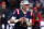 FRANKFURT AM MAIN, GERMANY - NOVEMBER 12: Mac Jones #10 of the New England Patriots looks to pass from the pocket in the second quarter during the NFL match between the Indianapolis Colts and the New England Patriots at Deutsche Bank Park on November 12, 2023 in Frankfurt am Main, Germany. (Photo by Alex Grimm/Getty Images)