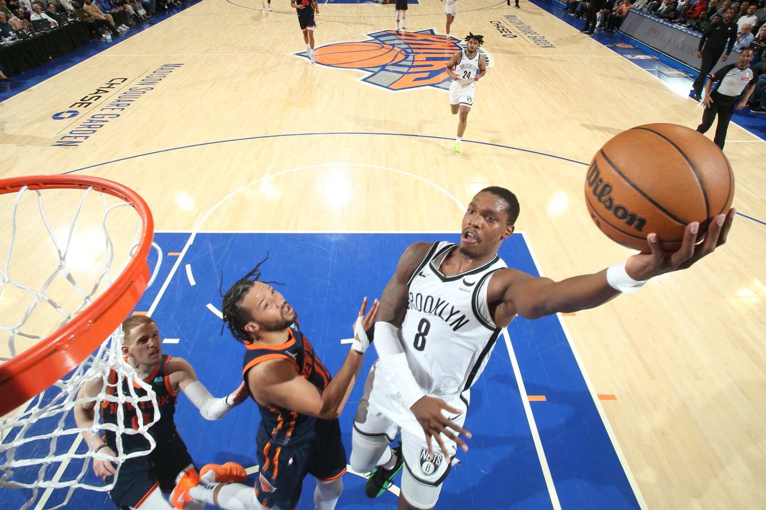 NEW YORK, NY - APRIL 12: Lonnie Walker IV #8 of the Brooklyn Nets drives to the basket during the game against the New York Knicks on April 12, 2024 at Madison Square Garden in New York City, New York. NOTE TO USER: User expressly acknowledges and agrees that, by downloading and or using this photograph, User is consenting to the terms and conditions of the Getty Images License Agreement. Mandatory Copyright Notice: Copyright 2024 NBAE (Photo by Nathaniel S. Butler/NBAE via Getty Images)