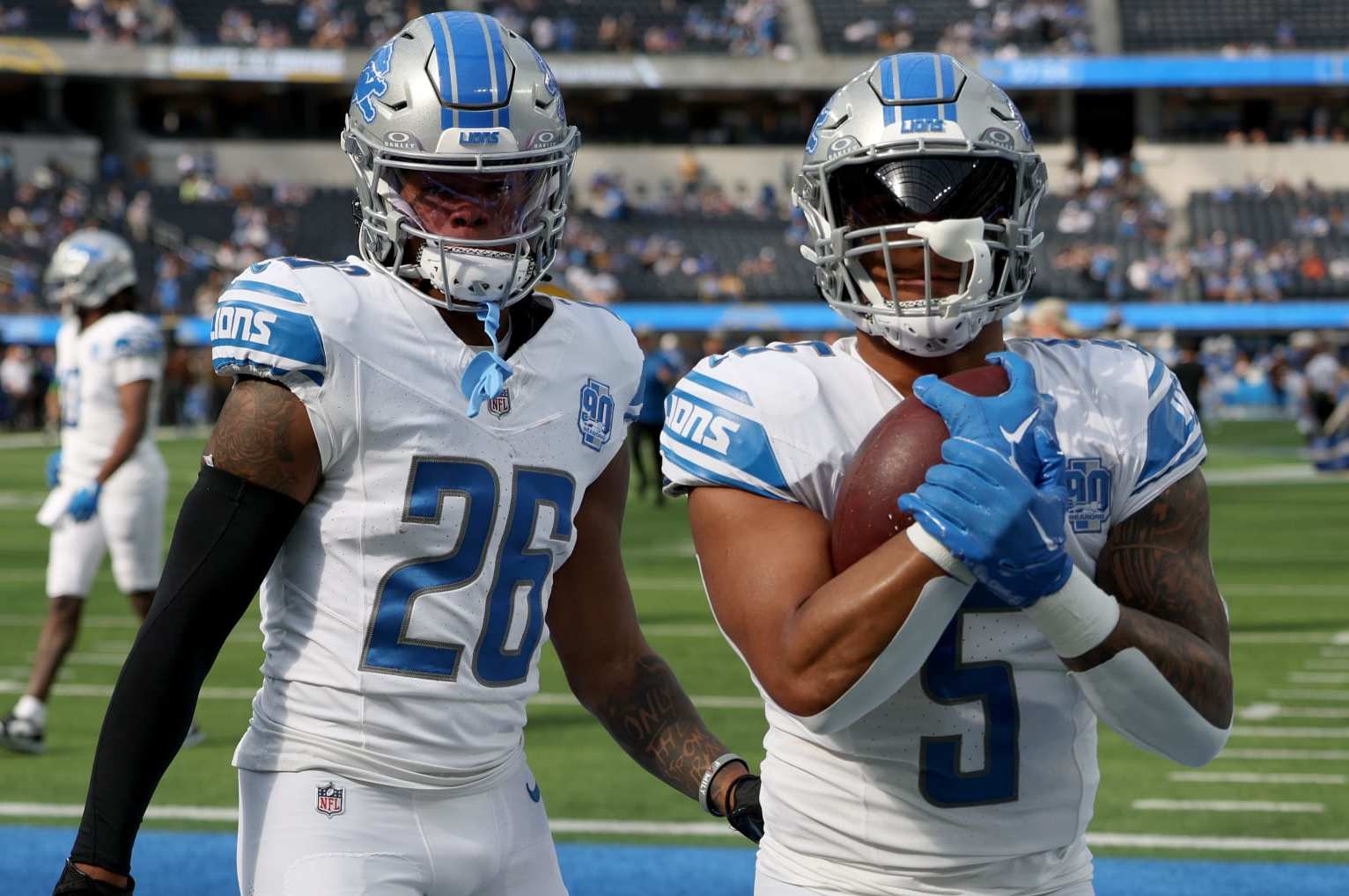 INGLEWOOD, CALIFORNIA - NOVEMBER 12: David Montgomery #5 of the Detroit Lions and Jahmyr Gibbs #26 of the Detroit Lions warm up before the game against the Los Angeles Chargers at SoFi Stadium on November 12, 2023 in Inglewood, California. (Photo by Harry How/Getty Images) INGLEWOOD, CALIFORNIA - NOVEMBER 12: David Montgomery #5 of the Detroit Lions and Jahmyr Gibbs #26 of the Detroit Lions warm up before the game against the Los Angeles Chargers at SoFi Stadium on November 12, 2023 in Inglewood, California. (Photo by Harry How/Getty Images)