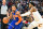 CLEVELAND, OHIO - MARCH 31: Jalen Brunson #11 of the New York Knicks drives to the basket around Donovan Mitchell #45 of the Cleveland Cavaliers during the first quarter at Rocket Mortgage Fieldhouse on March 31, 2023 in Cleveland, Ohio. NOTE TO USER: User expressly acknowledges and agrees that, by downloading and or using this photograph, User is consenting to the terms and conditions of the Getty Images License Agreement. (Photo by Jason Miller/Getty Images)