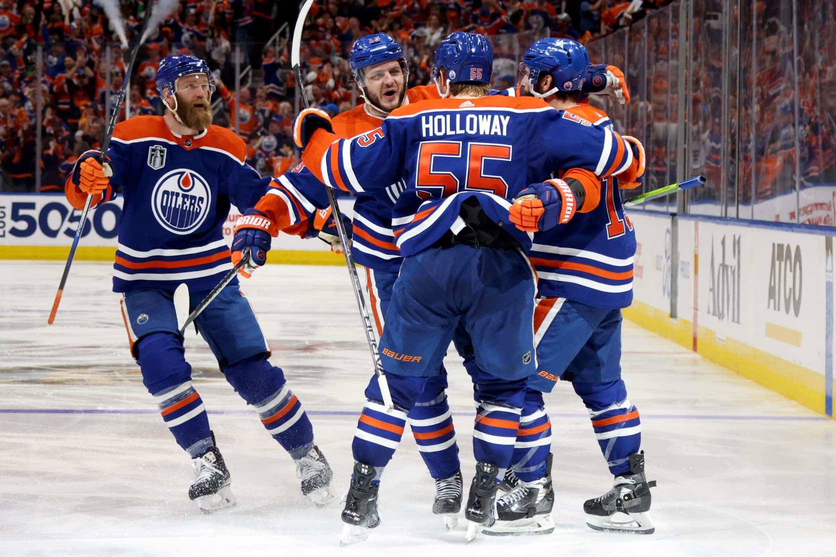 EDMONTON, ALBERTA - JUNE 21: Adam Henrique #19 of the Edmonton Oilers celebrates with Dylan Holloway #55, Mattias Janmark #13 and Mattias Ekholm #14 after scoring a goal during the second period of Game Six of the 2024 Stanley Cup Final between Florida Panthers and the Edmonton Oilers at Rogers Place on June 21, 2024 in Edmonton, Alberta. (Photo by Dave Sandford/NHLI via Getty Images)