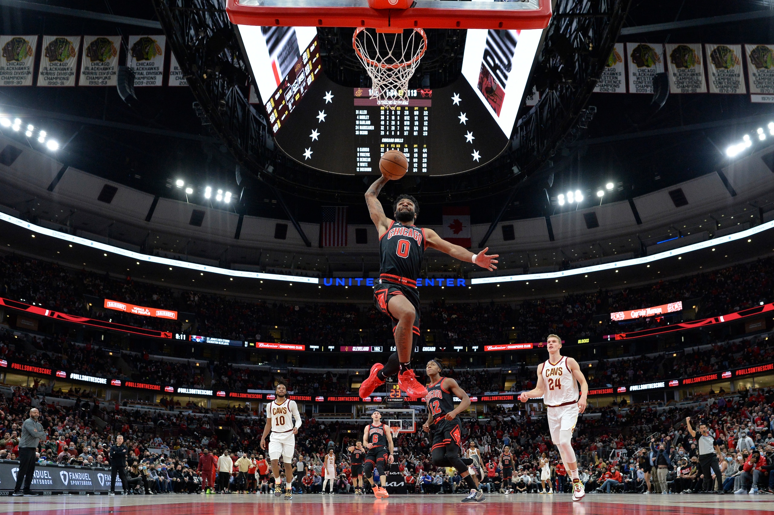 CHICAGO, ILLINOIS - JANUARY 19: Coby White #0 of the Chicago Bulls goes up to dunk in the second half against the Cleveland Cavaliers at United Center on January 19, 2022 in Chicago, Illinois. NOTE TO USER: User expressly acknowledges and agrees that, by downloading and or using this photograph, User is consenting to the terms and conditions of the Getty Images License Agreement. (Photo by Quinn Harris/Getty Images) CHICAGO, ILLINOIS - JANUARY 19: Coby White #0 of the Chicago Bulls goes up to dunk in the second half against the Cleveland Cavaliers at United Center on January 19, 2022 in Chicago, Illinois. NOTE TO USER: User expressly acknowledges and agrees that, by downloading and or using this photograph, User is consenting to the terms and conditions of the Getty Images License Agreement. (Photo by Quinn Harris/Getty Images)