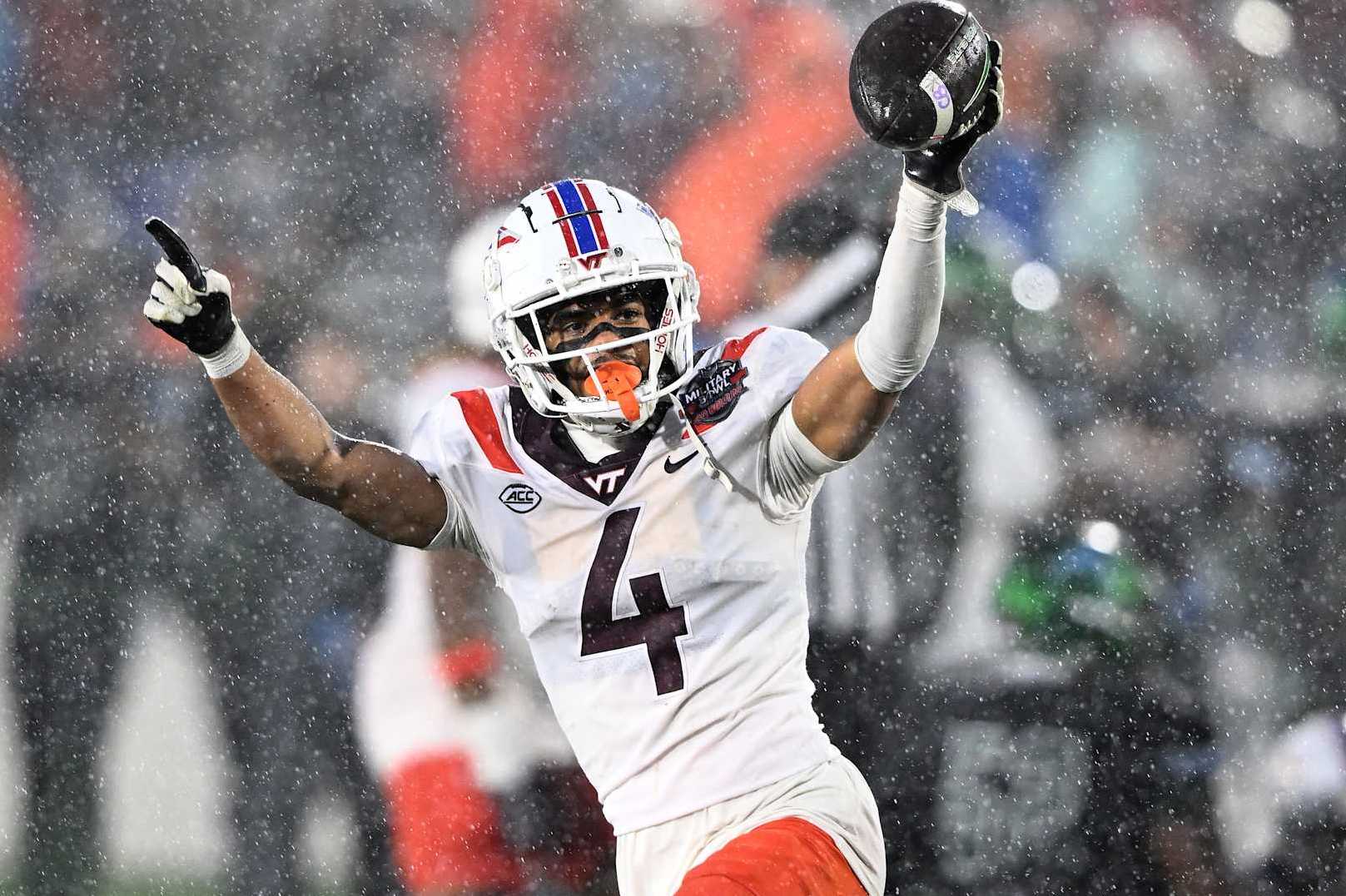 ANNAPOLIS, MARYLAND - DECEMBER 27: Mansoor Delane #4 of the Virginia Tech Hokies celebrates after recovering a fumble in the fourth quarter against the Tulane Green Wave during the Military Bowl presented by GoBowling.com  at Navy-Marine Corps Memorial Stadium on December 27, 2023 in Annapolis, Maryland. (Photo by Greg Fiume/Getty Images)