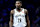 PHILADELPHIA, PENNSYLVANIA - NOVEMBER 22: Dorian Finney-Smith #28 of the Brooklyn Nets rests during a break in the game against the Philadelphia 76ers during the NBA Emirates Cup at the Wells Fargo Center on November 22, 2024 in Philadelphia, Pennsylvania. NOTE TO USER: User expressly acknowledges and agrees that, by downloading and or using this photograph, User is consenting to the terms and conditions of the Getty Images License Agreement. (Photo by G Fiume/Getty Images)