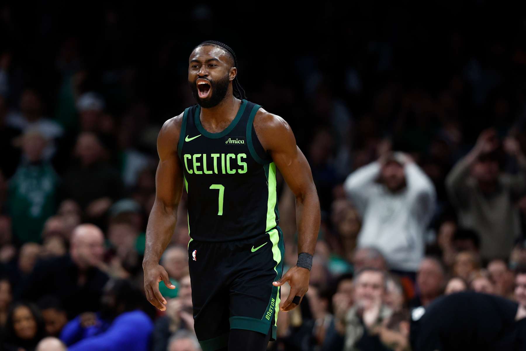 Boston, MA - November 25: Boston Celtics SG Jaylen Brown reacts after making a 3-pointer in the second quarter. (Photo by Danielle Parhizkaran/The Boston Globe via Getty Images)