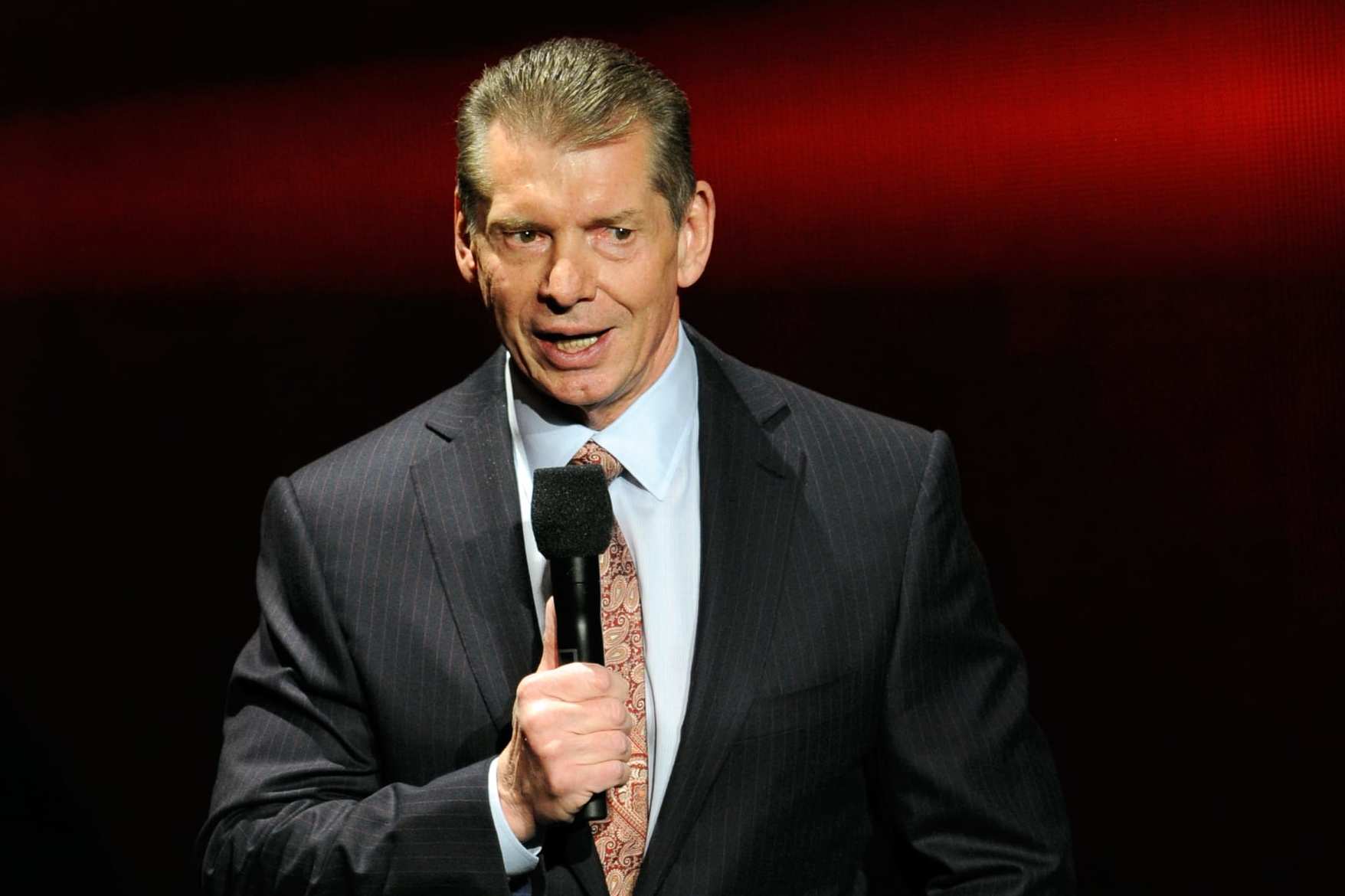 LAS VEGAS, NV - JANUARY 08: WWE Chairman and CEO Vince McMahon speaks at a news conference announcing the WWE Network at the 2014 International CES at the Encore Theater at Wynn Las Vegas on January 8, 2014 in Las Vegas, Nevada. The network will launch on February 24, 2014 as the first-ever 24/7 streaming network, offering both scheduled programs and video on demand. The USD 9.99 per month subscription will include access to all 12 live WWE pay-per-view events each year. CES, the world's largest annual consumer technology trade show, runs through January 10 and is expected to feature 3,200 exhibitors showing off their latest products and services to about 150,000 attendees. (Photo by Ethan Miller/Getty Images) LAS VEGAS, NV - JANUARY 08: WWE Chairman and CEO Vince McMahon speaks at a news conference announcing the WWE Network at the 2014 International CES at the Encore Theater at Wynn Las Vegas on January 8, 2014 in Las Vegas, Nevada. The network will launch on February 24, 2014 as the first-ever 24/7 streaming network, offering both scheduled programs and video on demand. The USD 9.99 per month subscription will include access to all 12 live WWE pay-per-view events each year. CES, the world's largest annual consumer technology trade show, runs through January 10 and is expected to feature 3,200 exhibitors showing off their latest products and services to about 150,000 attendees. (Photo by Ethan Miller/Getty Images)