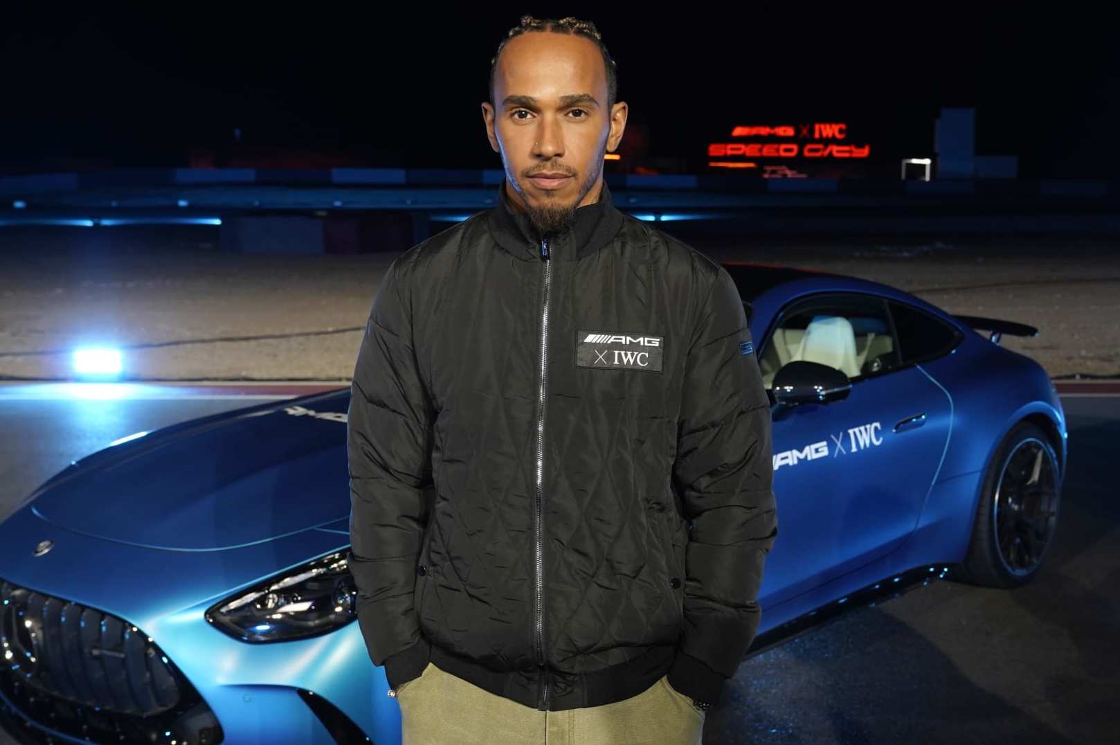 LAS VEGAS, NEVADA - NOVEMBER 14: Lewis Hamilton attends an exclusive event organized by IWC Schaffhausen and Mercedes-AMG at "Speed City” on November 14, 2023 in Las Vegas, Nevada. Ahead of the Grand Prix, Speed City is an outdoor desert camp and entertainment venue taking over the famous Speedvegas racetrack. (Photo by Presley Ann/Getty Images for IWC Schaffhausen)