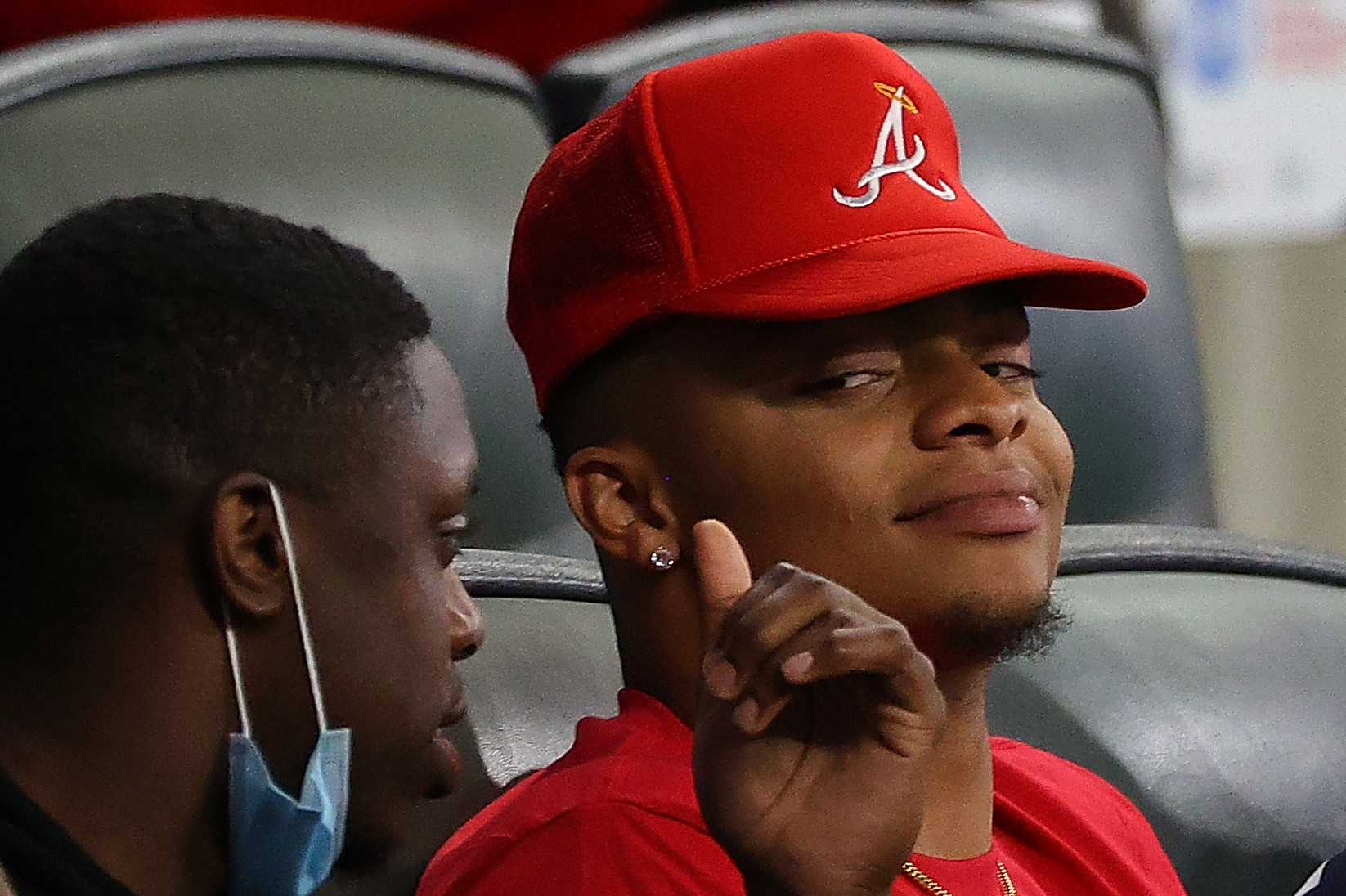 ATLANTA, GEORGIA - APRIL 26: NFL quarterback prospect Justin Fields watches the game between the Atlanta Braves and the Chicago Cubs at Truist Park on April 26, 2021 in Atlanta, Georgia. (Photo by Kevin C. Cox/Getty Images)