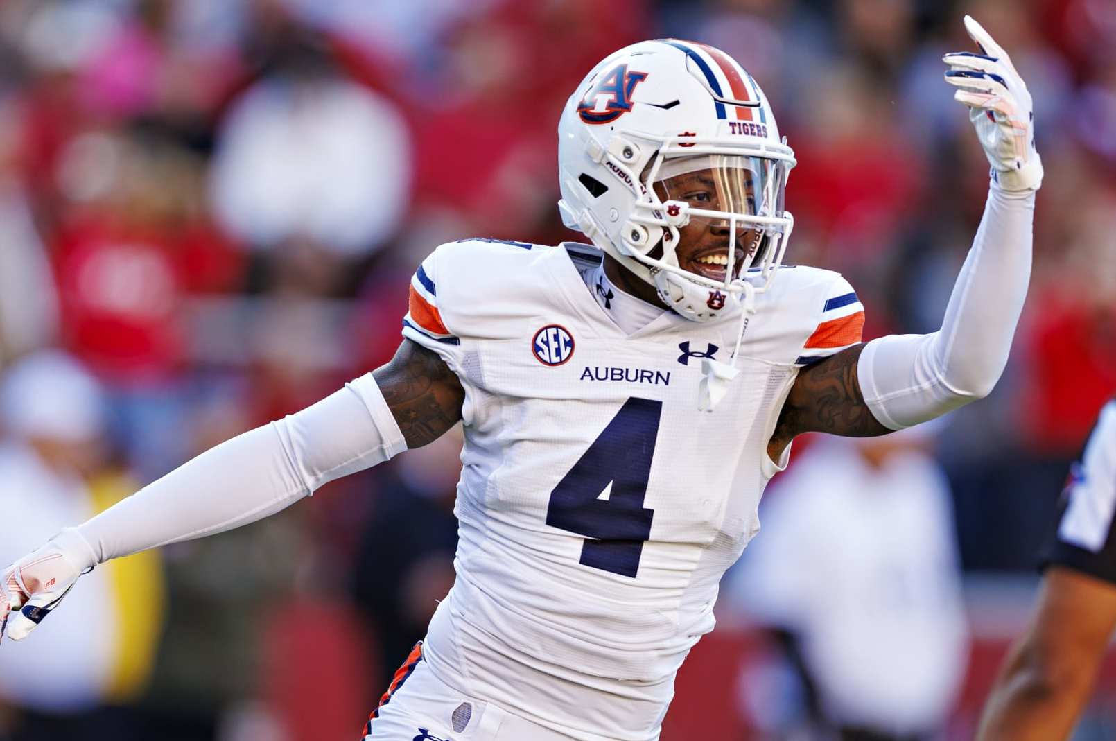 FAYETTEVILLE, ARKANSAS - NOVEMBER 11: D.J. James #4 of the Auburn Tigers celebrates after a big play during the game against the Arkansas Razorbacks at Donald W. Reynolds Razorback Stadium on November 11, 2023 in Fayetteville, Arkansas. The Tigers defeated the Razorbacks 48-10.  (Photo by Wesley Hitt/Getty Images)