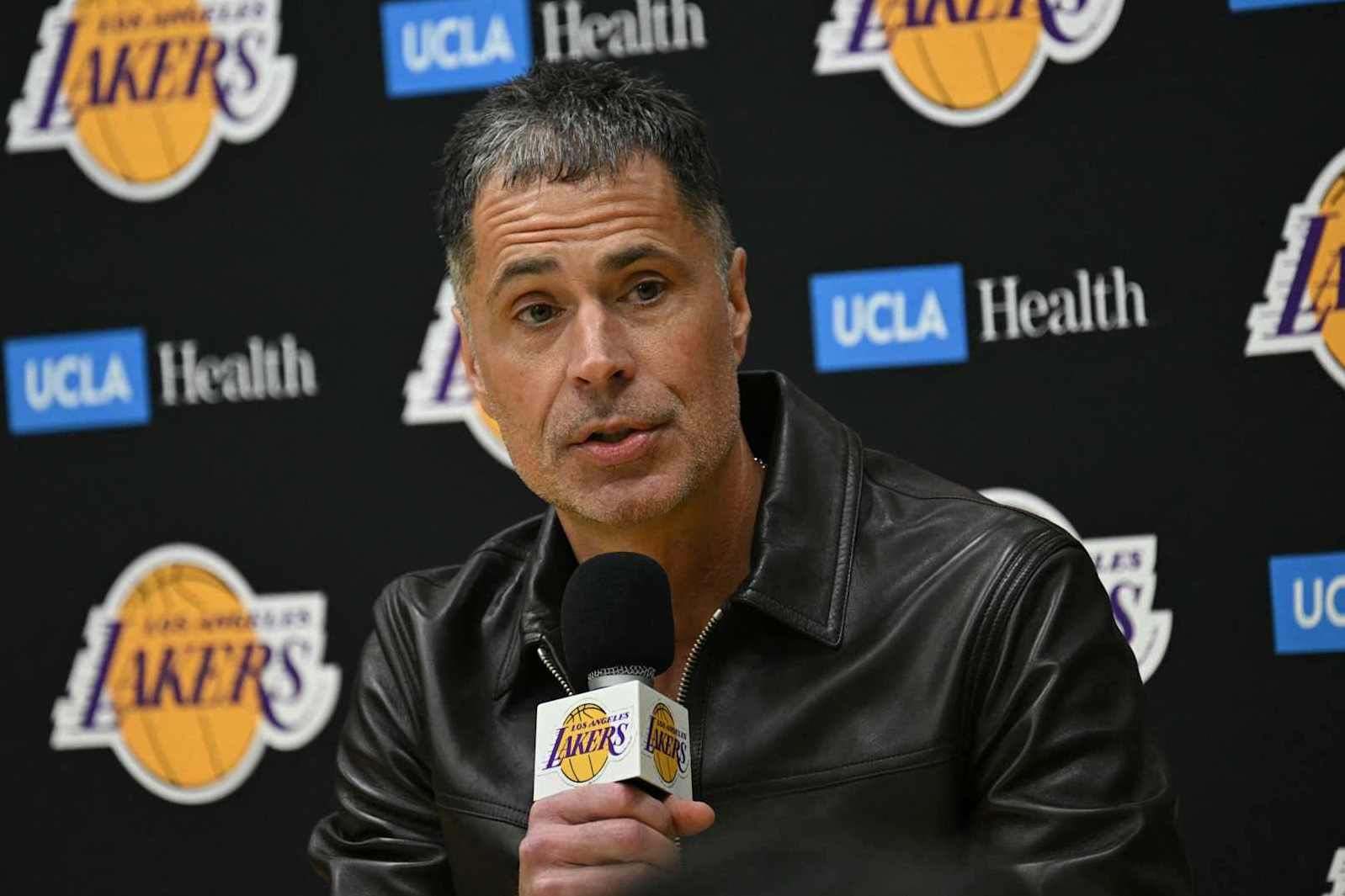 Los Angeles Lakers general manager Rob Pelinka speaks during the presentation of the new Los Angeles Lakers player Slovenian basketball player Luka Doncic at the UCLA Health Training Center, in El Segundo, California on February 4, 2025. Slovenian star Luka Doncic said February 2, 2025 he thought he'd spend his entire NBA career in Dallas, thanking fans in Texas for making it feel like home a day after the Mavericks abruptly traded him to the Los Angeles Lakers. (Photo by Patrick T. Fallon / AFP) (Photo by PATRICK T. FALLON/AFP via Getty Images)          