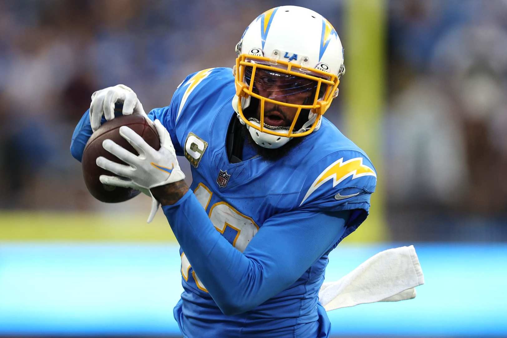INGLEWOOD, CALIFORNIA - NOVEMBER 12: Keenan Allen #13 of the Los Angeles Chargers catches a pass during the fourth quarter against the Detroit Lions at SoFi Stadium on November 12, 2023 in Inglewood, California. (Photo by Harry How/Getty Images)