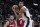 San Antonio Spurs center Victor Wembanyama (1) grabs a pass in front of Miami Heat forward Kevin Love (42) during the second half of an NBA basketball game in San Antonio, Sunday, Nov. 12, 2023. (AP Photo/Eric Gay)