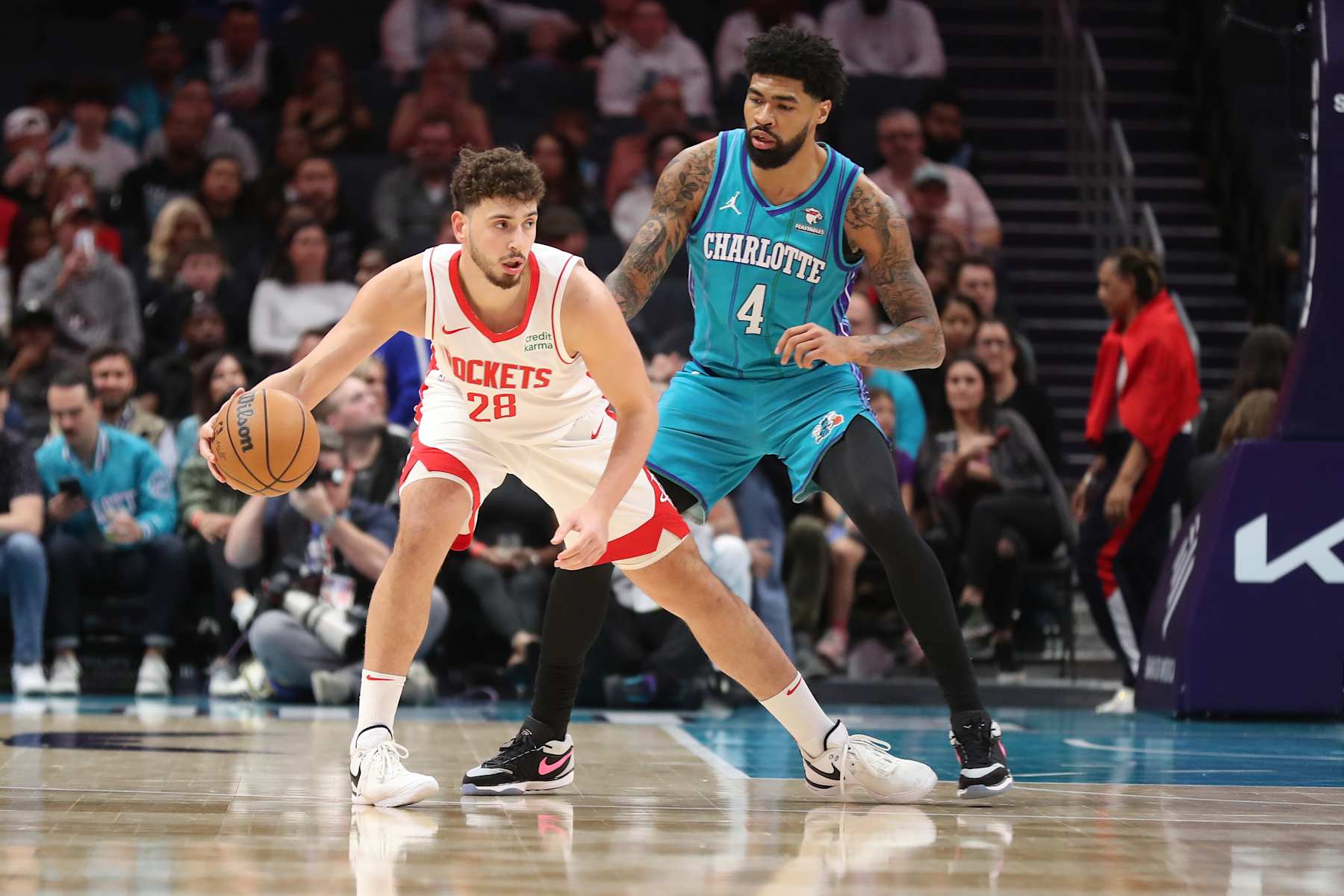 CHARLOTTE, NC - JANUARY 26:  Alperen Sengun #28 of the Houston Rockets handles the ball during the game against the Charlotte Hornets on January 26, 2024 at Spectrum Center in Charlotte, North Carolina. NOTE TO USER: User expressly acknowledges and agrees that, by downloading and or using this photograph, User is consenting to the terms and conditions of the Getty Images License Agreement.  Mandatory Copyright Notice:  Copyright 2024 NBAE (Photo by Brock Williams-Smith/NBAE via Getty Images)