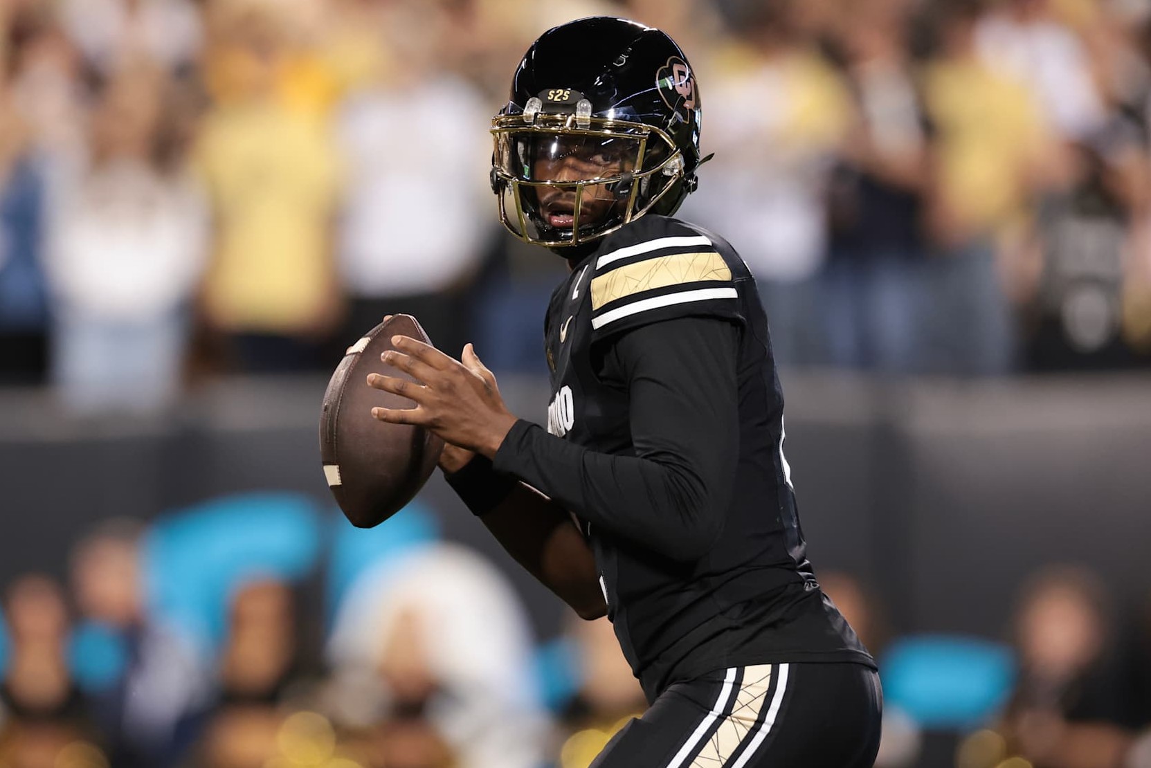 BOULDER, COLORADO - OCTOBER 12: Shedeur Sanders #2 of the Colorado Buffaloes looks to pass during the first half against the Kansas State Wildcats at Folsom Field on October 12, 2024 in Boulder, Colorado. (Photo by Andrew Wevers/Getty Images)