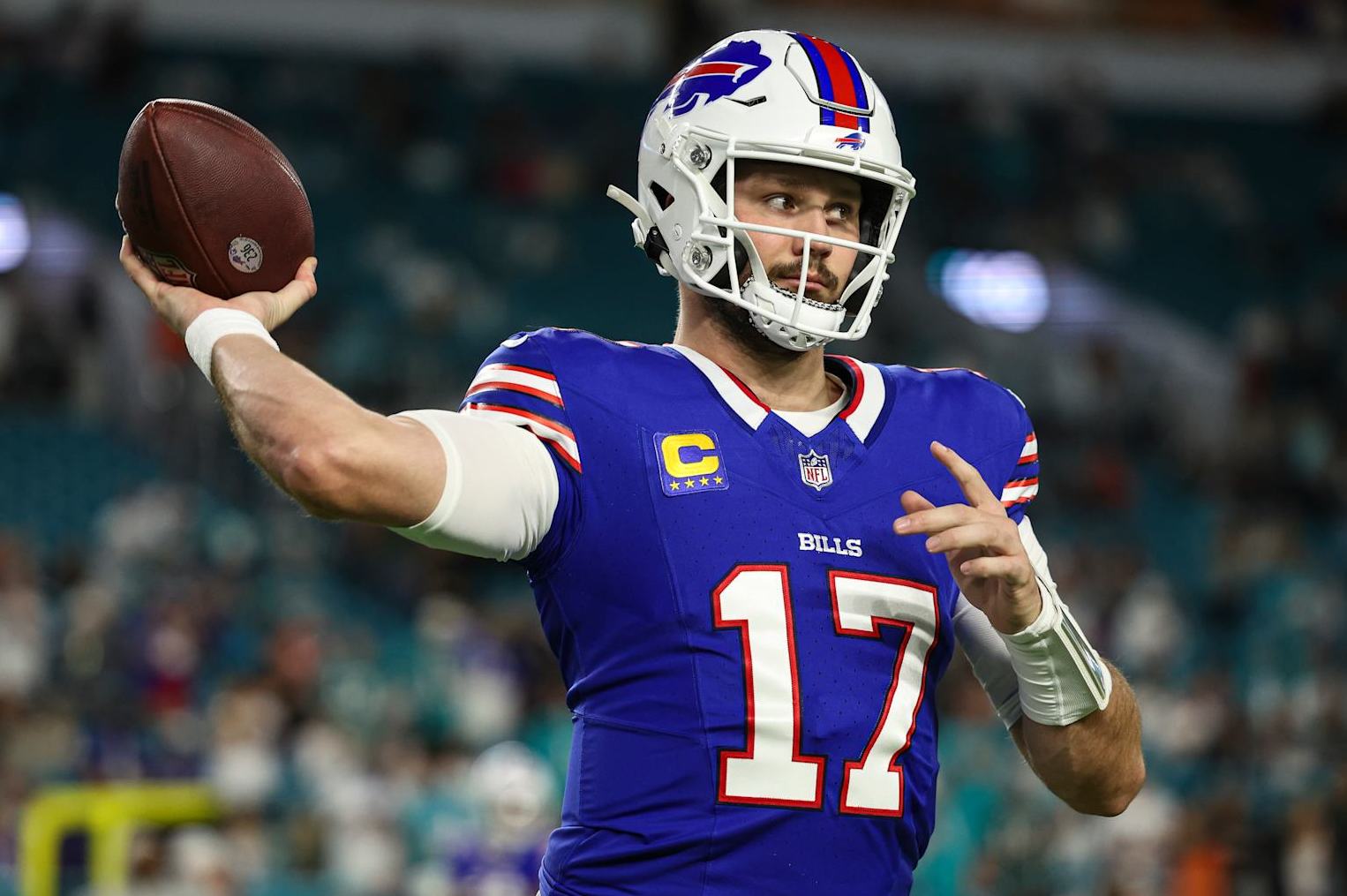 MIAMI GARDENS, FL - JANUARY 07: Josh Allen #17 of the Buffalo Bills warms up prior to an NFL football game against the Miami Dolphins at Hard Rock Stadium on January 7, 2024 in Miami Gardens, Florida. (Photo by Perry Knotts/Getty Images)
