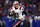 BUFFALO, NEW YORK - JANUARY 15: Mac Jones #10 of the New England Patriots looks to pass during the third quarter against the Buffalo Bills at Highmark Stadium on January 15, 2022 in Buffalo, New York. (Photo by Bryan M. Bennett/Getty Images)