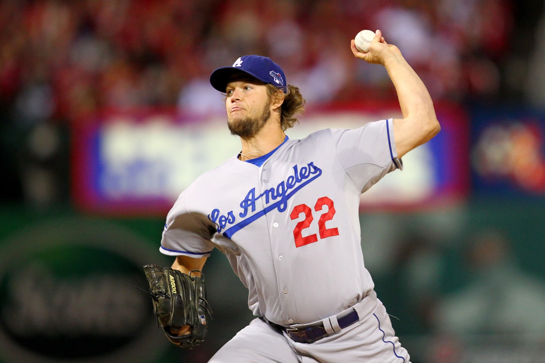 ST LOUIS, MO - OCTOBER 18:  Clayton Kershaw #22 of the Los Angeles Dodgers pitches in the first inning against the St. Louis Cardinals in Game Six of the National League Championship Series at Busch Stadium on October 18, 2013 in St Louis, Missouri.  (Photo by Dilip Vishwanat/Getty Images)