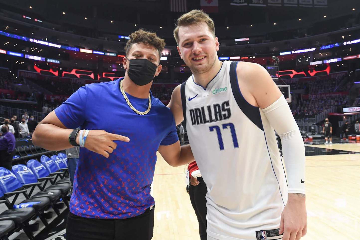 LOS ANGELES, CA - MAY 25: Luka Doncic #77 of the Dallas Mavericks poses with Chiefs Quarterback, Patrick Mahomes after the game against the LA Clippers during Round 1, Game 2 of the 2021 NBA Playoffs on May 25, 2021 at STAPLES Center in Los Angeles, California. NOTE TO USER: User expressly acknowledges and agrees that, by downloading and/or using this Photograph, user is consenting to the terms and conditions of the Getty Images License Agreement. Mandatory Copyright Notice: Copyright 2021 NBAE (Photo by Juan Ocampo/NBAE via Getty Images)