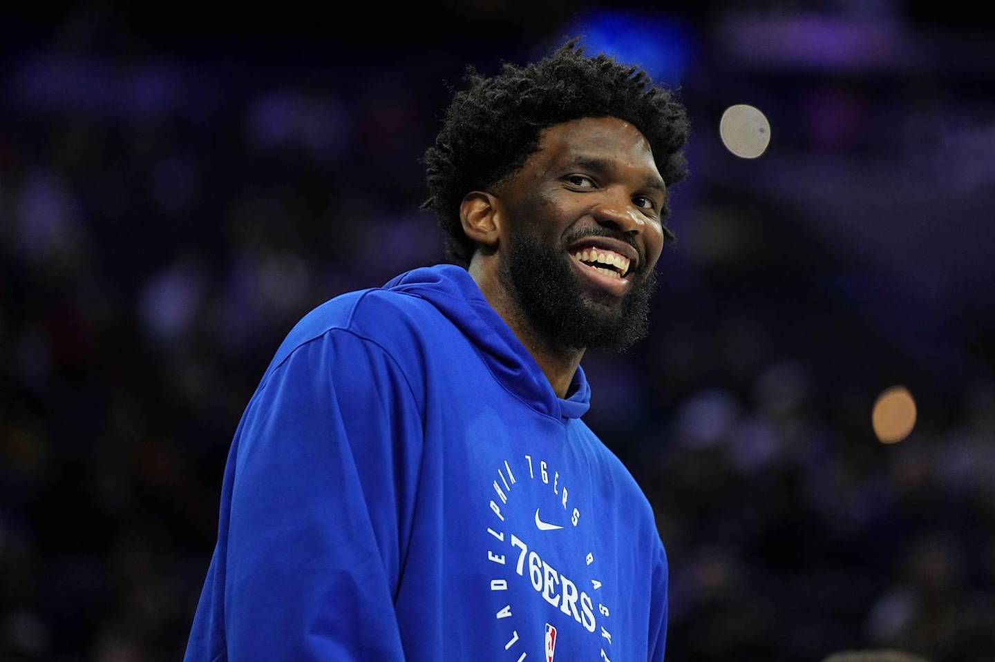 PHILADELPHIA, PENNSYLVANIA - OCTOBER 16: Joel Embiid #21 of the Philadelphia 76ers smiles against the Brooklyn Nets in the first half of the preseason game at the Wells Fargo Center on October 16, 2024 in Philadelphia, Pennsylvania. NOTE TO USER: User expressly acknowledges and agrees that, by downloading and/or using this photograph, user is consenting to the terms and conditions of the Getty Images License Agreement. (Photo by Mitchell Leff/Getty Images)