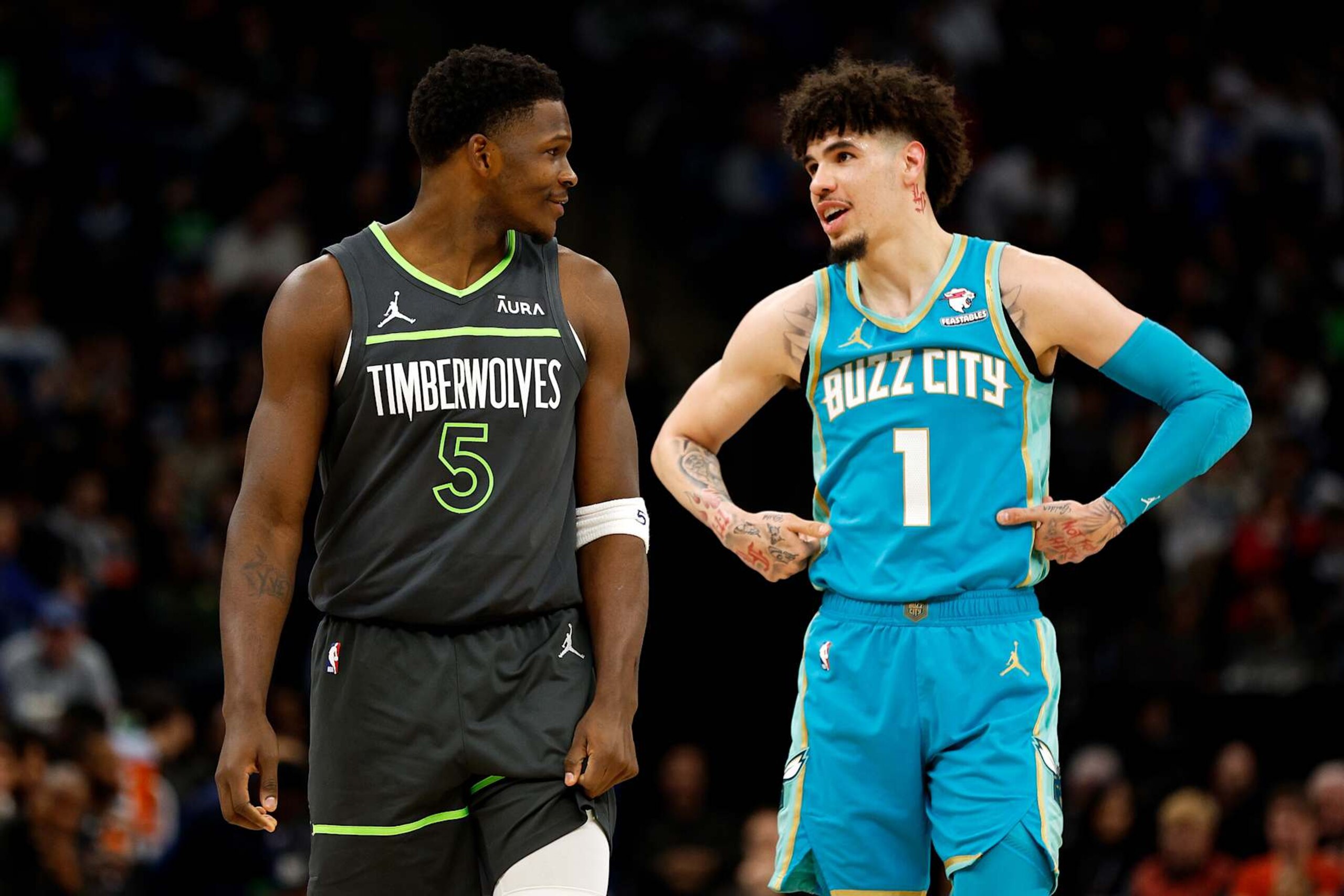 MINNEAPOLIS, MINNESOTA - JANUARY 22: Anthony Edwards #5 of the Minnesota Timberwolves and LaMelo Ball #1 of the Charlotte Hornets talk in the third quarter at Target Center on January 22, 2024 in Minneapolis, Minnesota. The Hornets won 128-125. NOTE TO USER: User expressly acknowledges and agrees that, by downloading and or using this photograph, User is consenting to the terms and conditions of the Getty Images License Agreement. (Photo by David Berding/Getty Images) MINNEAPOLIS, MINNESOTA - JANUARY 22: Anthony Edwards #5 of the Minnesota Timberwolves and LaMelo Ball #1 of the Charlotte Hornets talk in the third quarter at Target Center on January 22, 2024 in Minneapolis, Minnesota. The Hornets won 128-125. NOTE TO USER: User expressly acknowledges and agrees that, by downloading and or using this photograph, User is consenting to the terms and conditions of the Getty Images License Agreement. (Photo by David Berding/Getty Images)