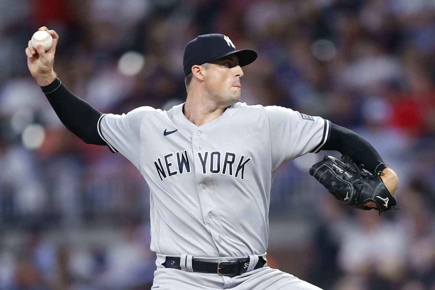 ATLANTA, GEORGIA - AUGUST 15: Clay Holmes #35 of the New York Yankees pitches during the eighth inning against the Atlanta Braves at Truist Park on August 15, 2023 in Atlanta, Georgia. (Photo by Todd Kirkland/Getty Images)