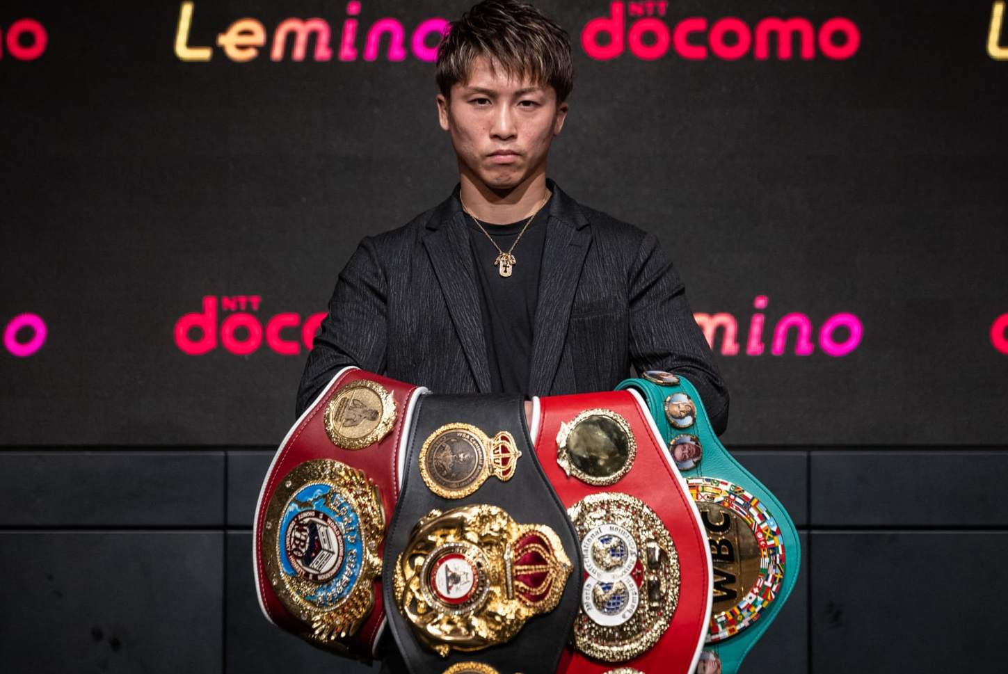 TOPSHOT - Japan's Naoya Inoue poses for photographs following a press conference ahead of his September 3 super bantamweight fight with Ireland's TJ Doheny, in Tokyo on July 16, 2024. (Photo by Yuichi YAMAZAKI / AFP) (Photo by YUICHI YAMAZAKI/AFP via Getty Images)