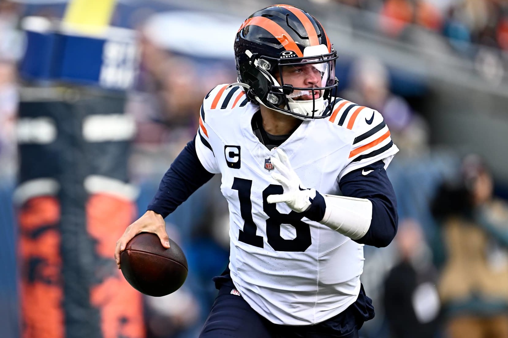 CHICAGO, ILLINOIS - NOVEMBER 24: Caleb Williams #18 of the Chicago Bears scrambles during the first quarter against the Minnesota Vikings at Soldier Field on November 24, 2024 in Chicago, Illinois. (Photo by Quinn Harris/Getty Images)