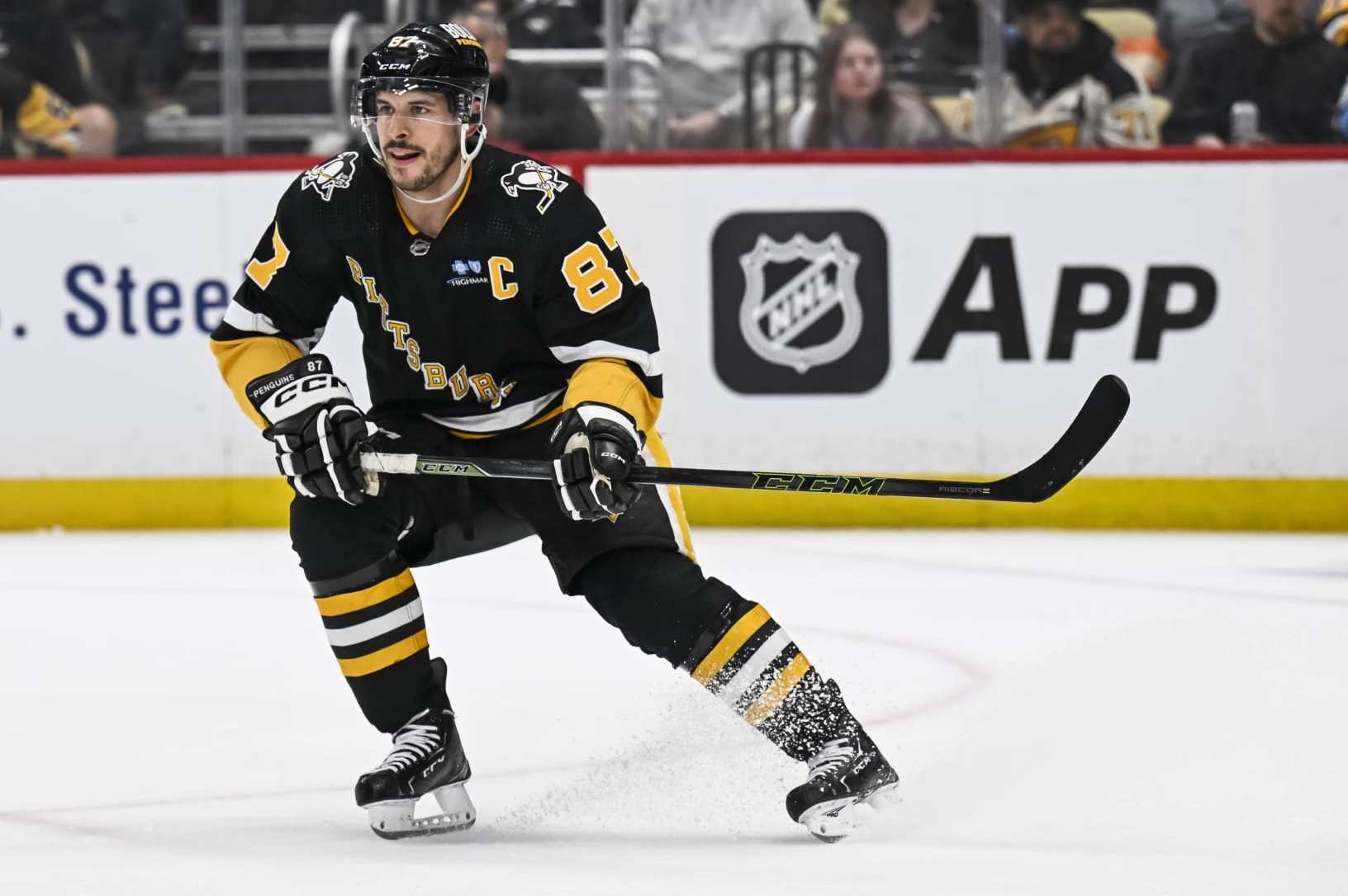 PITTSBURGH, PA - APRIL 11: Pittsburgh Penguins center Sidney Crosby (87) skates during the third period in the NHL game between the Pittsburgh Penguins and the Detroit Red Wings on April 11, 2024, at PPG Paints Arena in Pittsburgh, PA. (Photo by Jeanine Leech/Icon Sportswire via Getty Images)