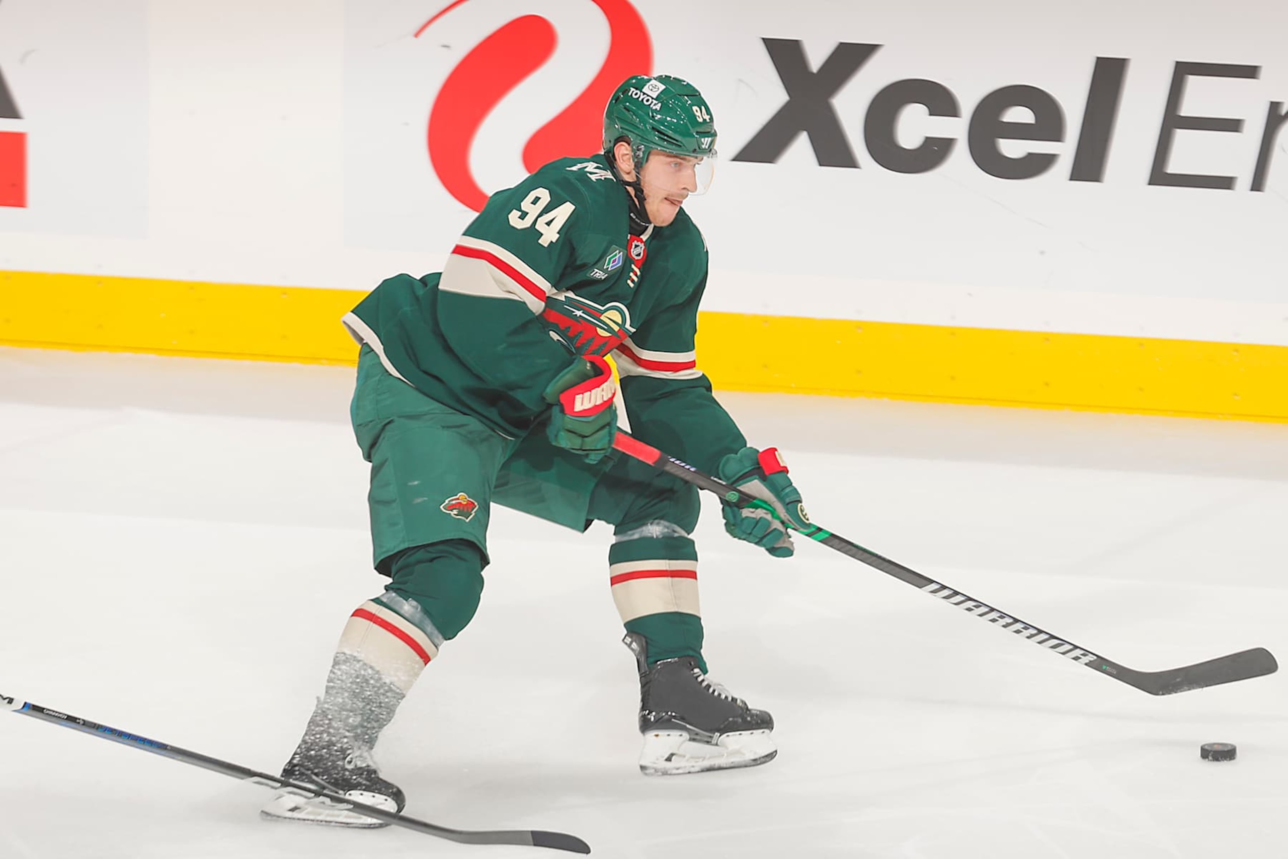SAINT PAUL, MN - OCTOBER 10: Jakub Lauko #94 of the Minnesota Wild handles the puck against the Columbus Blue Jackets during the game at the Xcel Energy Center on October 10, 2024 in Saint Paul, Minnesota. (Photo by Bruce Kluckhohn/NHLI via Getty Images)