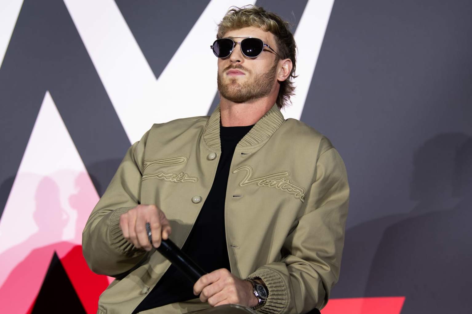 RIYADH, SAUDI ARABIA - MAY 23: Logan Paul looks on during King and Queen of the Ring Press Event at the WWE Experience on May 23, 2024 in Riyadh, Saudi Arabia. (Photo by WWE/Getty Images)