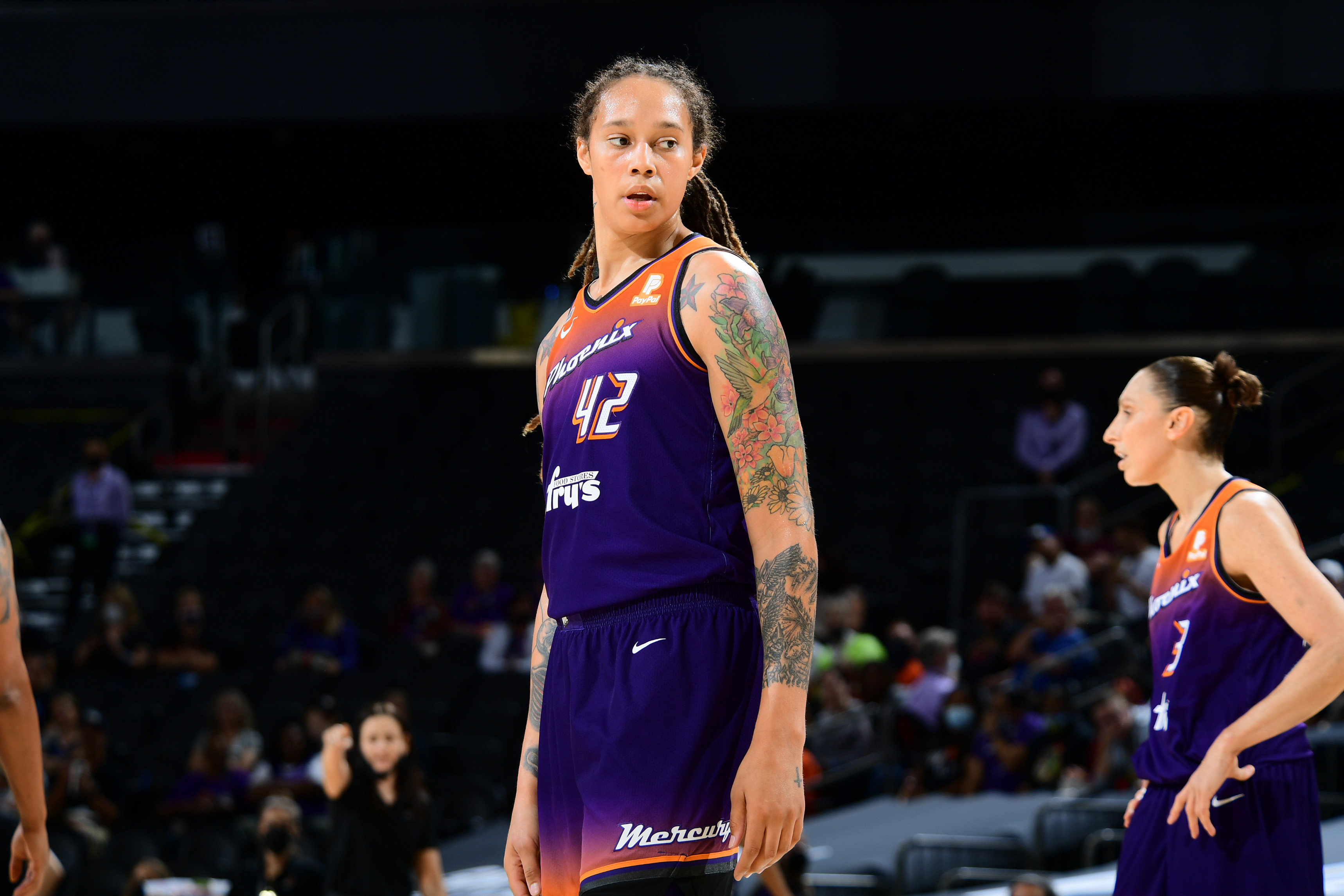 PHOENIX, AZ - AUGUST 31:  Brittney Griner #42 of the Phoenix Mercury looks on during the game against the Chicago Sky on August 31, 2021 at the Footprint Center in Phoenix, Arizona. NOTE TO USER: User expressly acknowledges and agrees that, by downloading and or using this photograph, user is consenting to the terms and conditions of the Getty Images License Agreement. Mandatory Copyright Notice: Copyright 2021 NBAE (Photo by Michael Gonzales/NBAE via Getty Images)