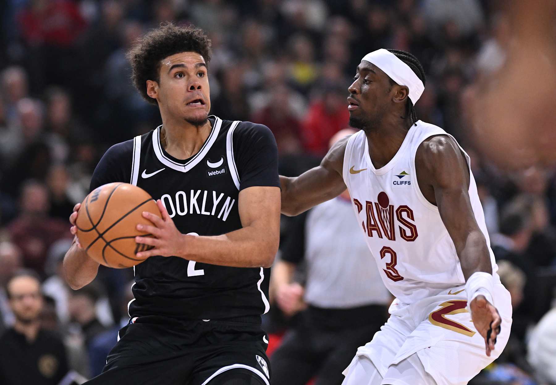 PARIS, FRANCE - JANUARY 11: Cam Johnson of Brooklyn Nets (L) of Brooklyn Nets in action against Caris LeVert (R) of Cleveland Cavaliers during the Paris Game 2024 match between Brooklyn Nets and Cleveland Cavaliers at Accor Arena in Paris, France on January 11, 2024. (Photo by Mustafa Yalcin/Anadolu via Getty Images)