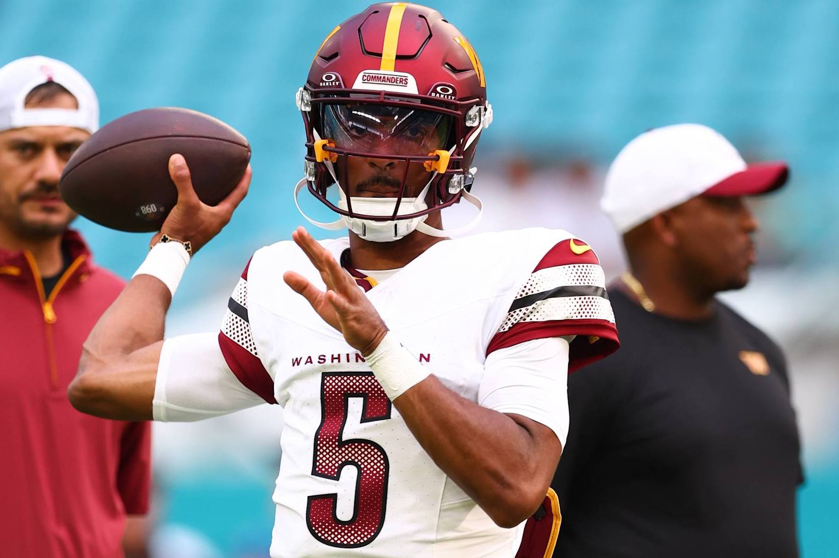 MIAMI GARDENS, FLORIDA - AUGUST 17: Jayden Daniels #5 of the Washington Commanders warms up prior to playing a preseason game against the Miami Dolphins at Hard Rock Stadium on August 17, 2024 in Miami Gardens, Florida. (Photo by Megan Briggs/Getty Images)