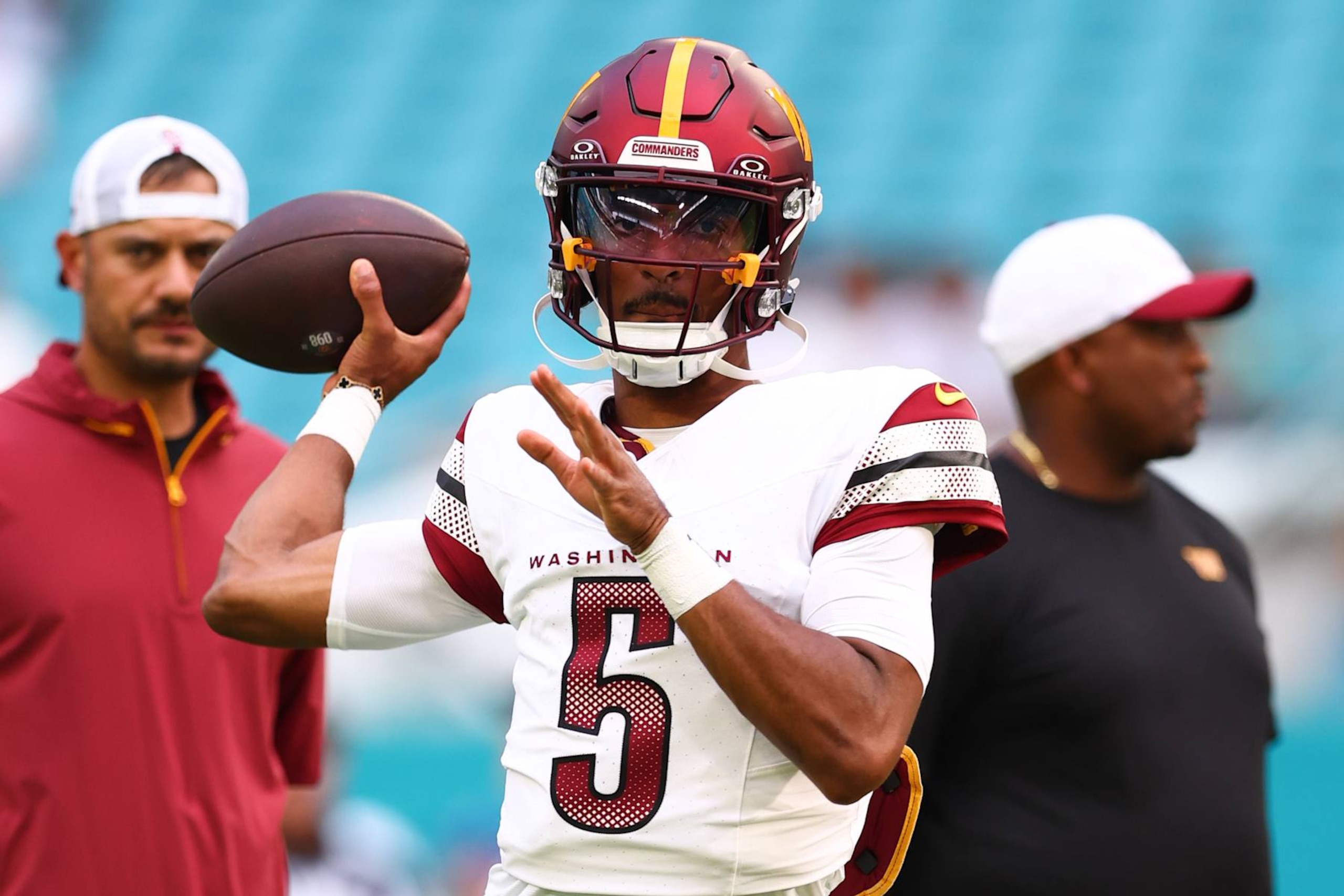 MIAMI GARDENS, FLORIDA - AUGUST 17: Jayden Daniels #5 of the Washington Commanders warms up prior to playing a preseason game against the Miami Dolphins at Hard Rock Stadium on August 17, 2024 in Miami Gardens, Florida. (Photo by Megan Briggs/Getty Images)