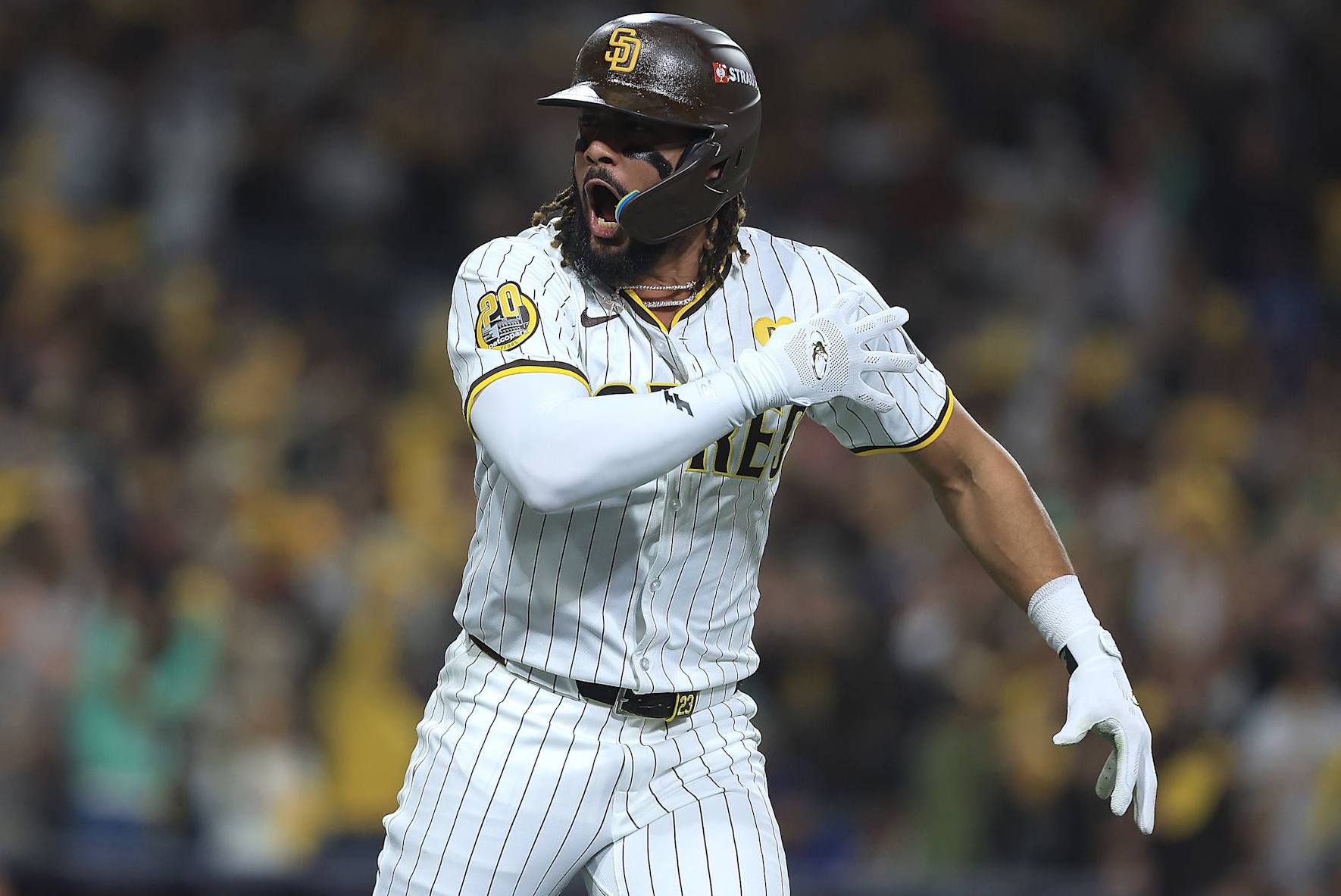 SAN DIEGO, CALIFORNIA - OCTOBER 08: Fernando Tatis Jr. #23 of the San Diego Padres celebrates after hitting a home run in the second inning against the Los Angeles Dodgers during Game Three of the Division Series at Petco Park on October 08, 2024 in San Diego, California. (Photo by Sean M. Haffey/Getty Images)