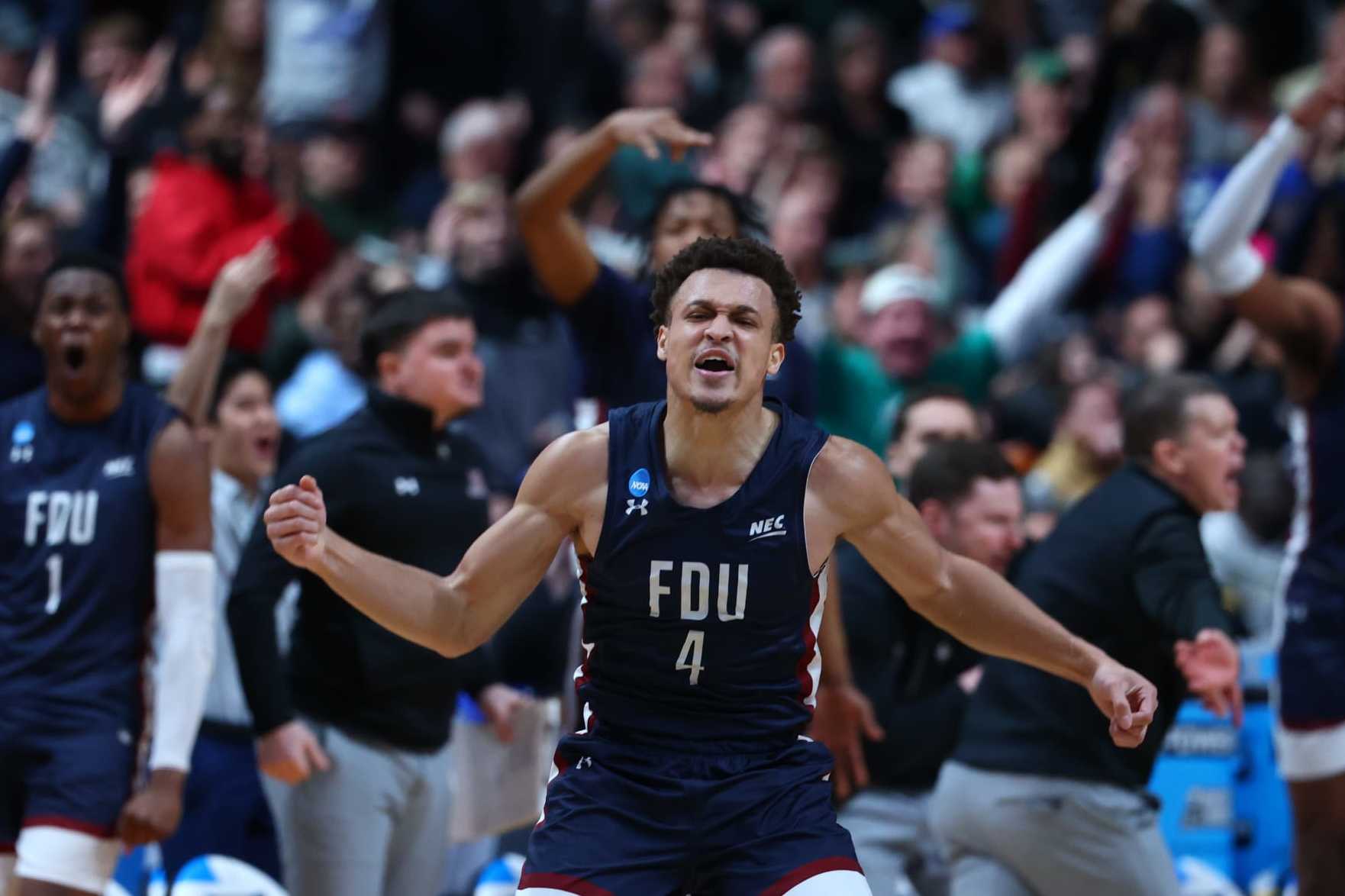 COLUMBUS, OH - MARCH 17: Grant Singleton #4 of the Fairleigh Dickinson Knights reacts to making a play against the Purdue Boilermakers during the first round of the 2022 NCAA Men's Basketball Tournament held at Nationwide Arena on March 17, 2023 in Columbus, Ohio. (Photo by Tyler Schank/NCAA Photos via Getty Images)